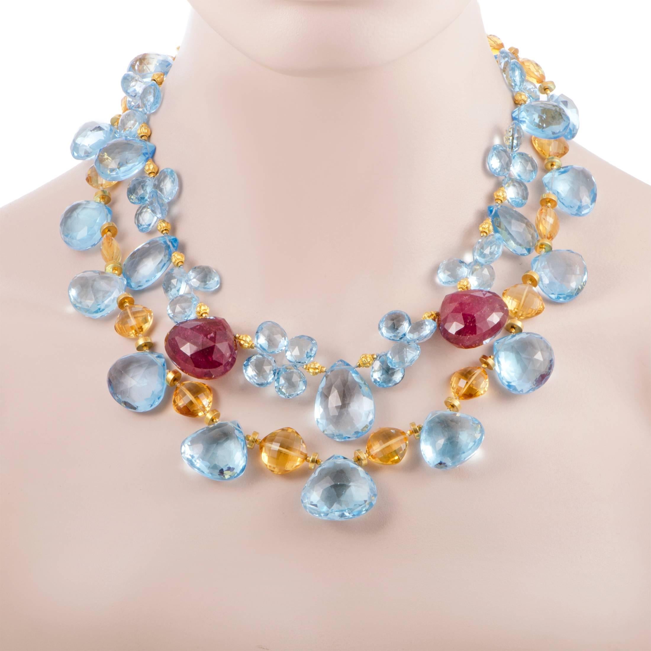 A statement piece that is given a whimsical appeal by the colorful ruby, topaz and citrine stones, while at the same time retaining classy, prestigious allure thanks to the elegant sheen of the gold, this necklace offers an appearance of pure beauty