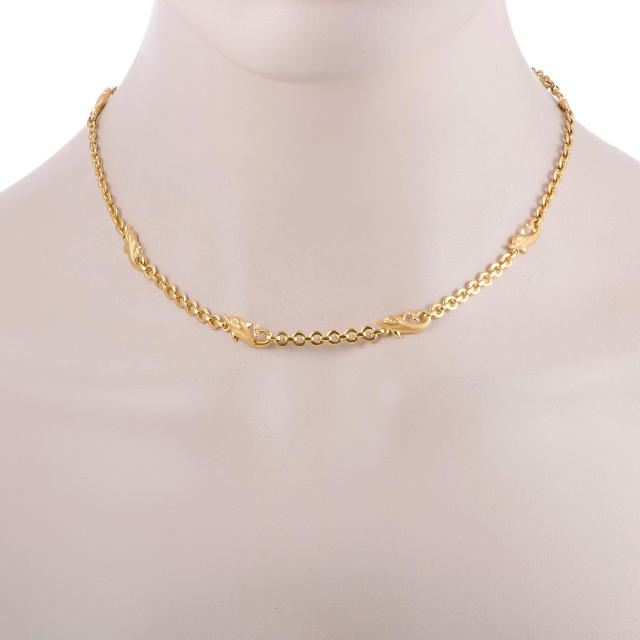 Polish your look with this gleaming round link chain necklace crafted in a luxe 18K gold by Carrera y Carrera. A series of exotic dolphin charms take center stage on this polished yellow gold necklace to lend eye-catching shine and trendy charm to