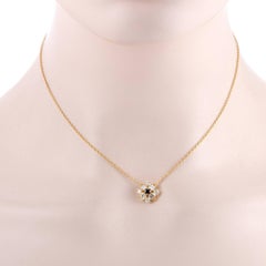 Van Cleef & Arpels Diamond and Sapphire Yellow Gold Flower Pendant Necklace