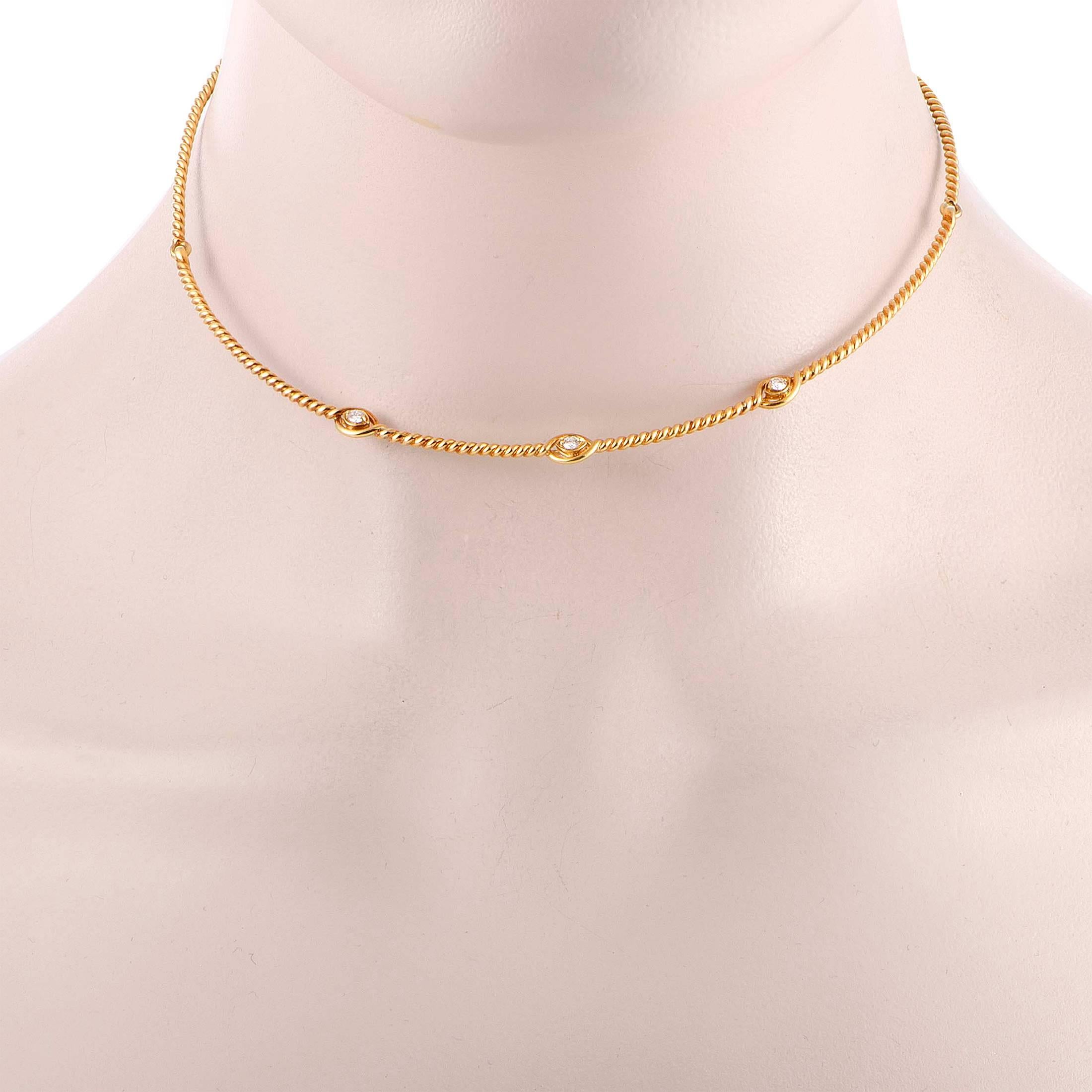 This absolutely elegant necklace by Dior is a sheer beauty! Its simple yet graceful design is made in 18K yellow gold and has three dazzling diamond stones that weigh .24ct in total and enhance the glamorous appeal of this stunning necklace.
