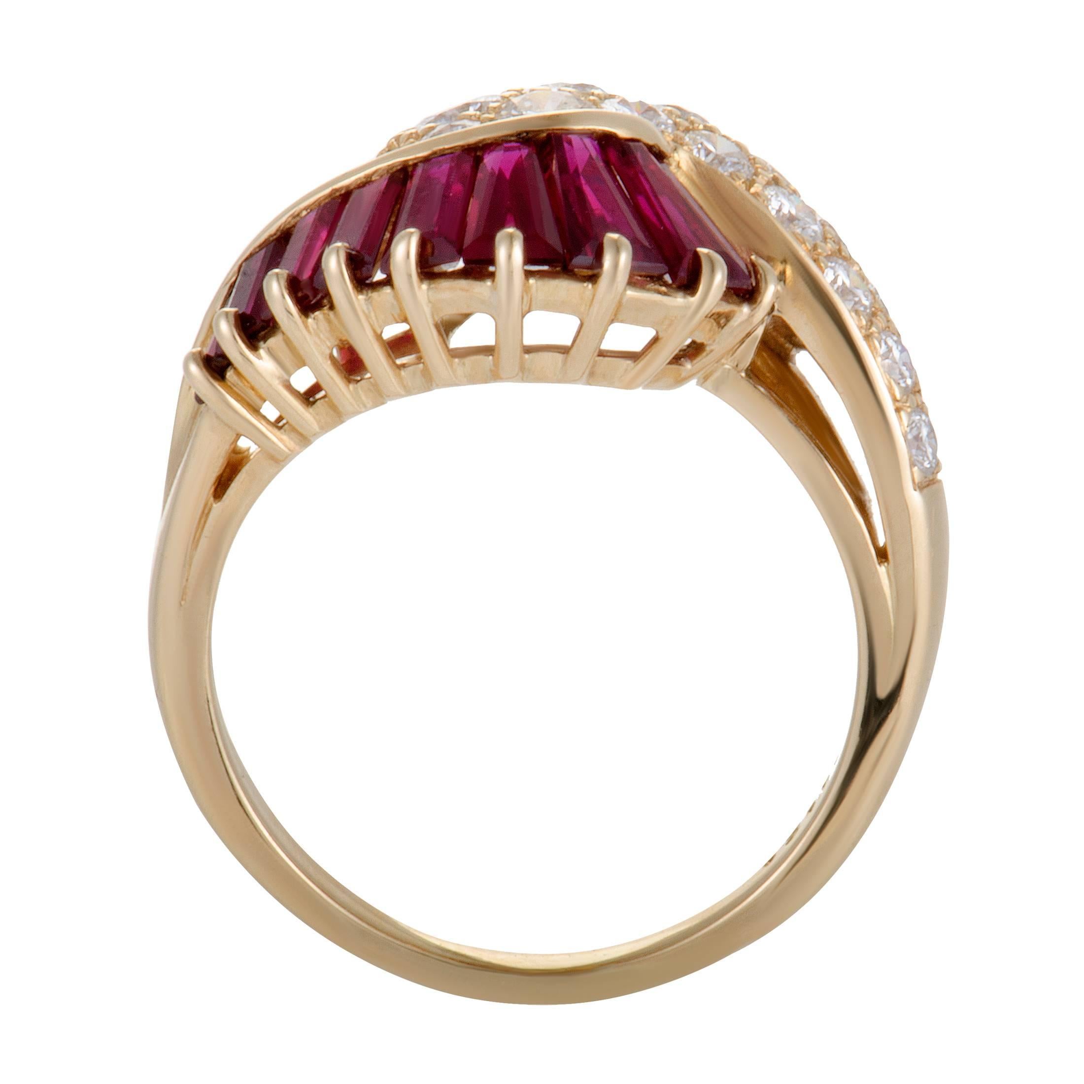Beauty and glam are eminent in this phenomenal 18K yellow gold ring by Oscar Heyman. Its fabulous design has a row of sparkling F-color, VVS-clarity 1.20ct diamonds that meet a row of precious invisible set rubies weighing in total 1.60ct. Together