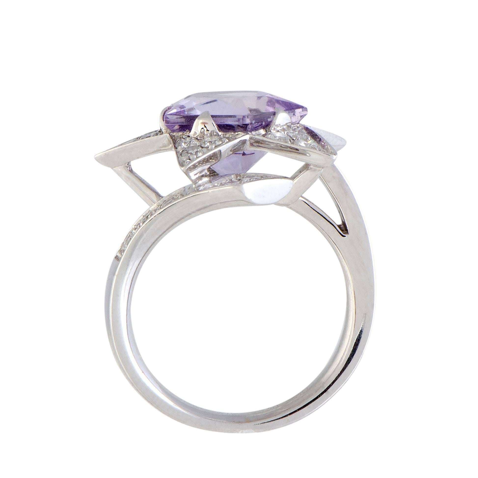 From the majestic “Comète” collection designed by Chanel comes this stunning ring made of prestigious 18K white gold that features glamorous, fashionable appearance. The ring is decorated with a striking amethyst and 0.55 carats of scintillating