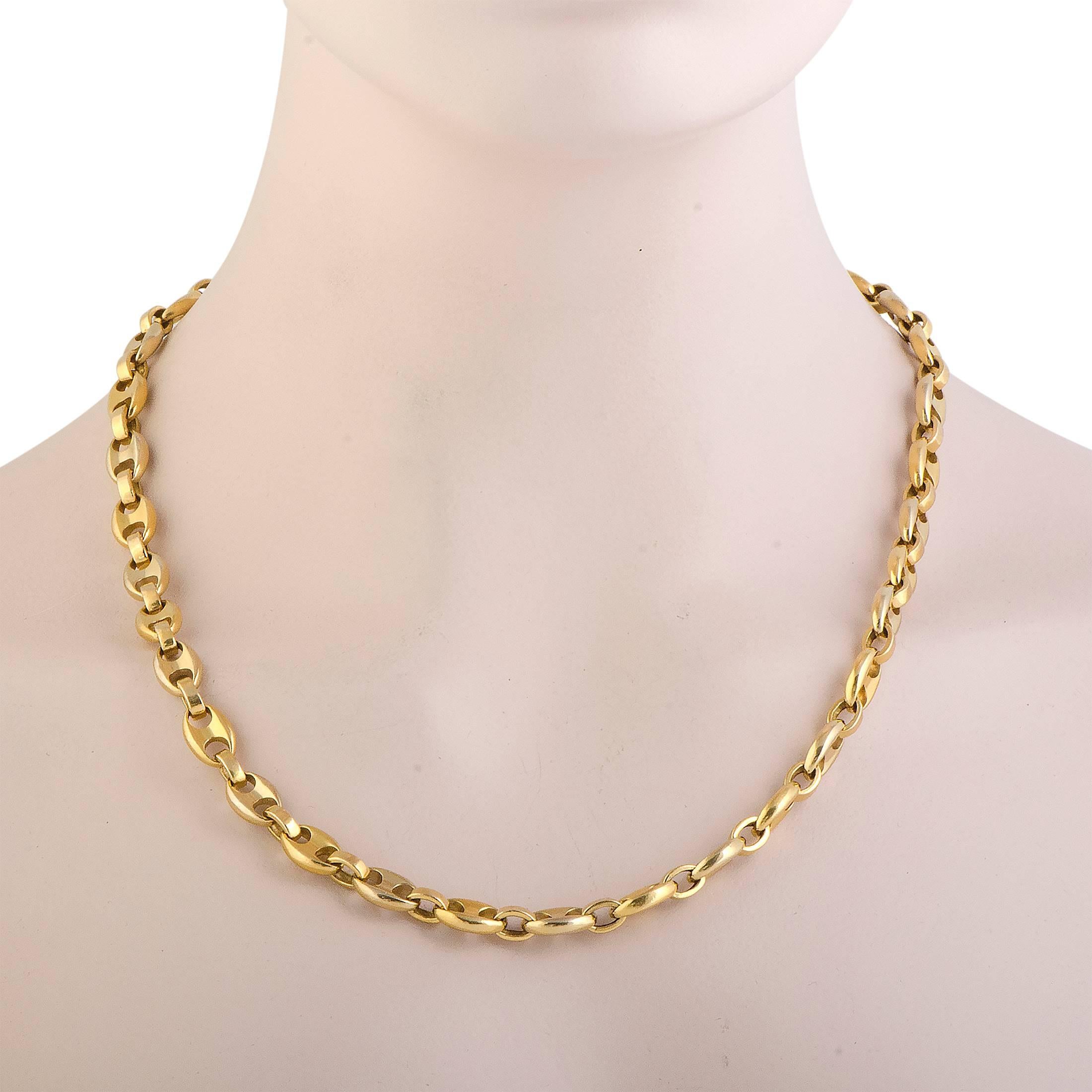 This stunning vintage Cartier necklace enchants with its neat, simple design and luxurious golden sheen. The necklace is made of radiant 18K yellow gold and weighs 147.5 grams.

