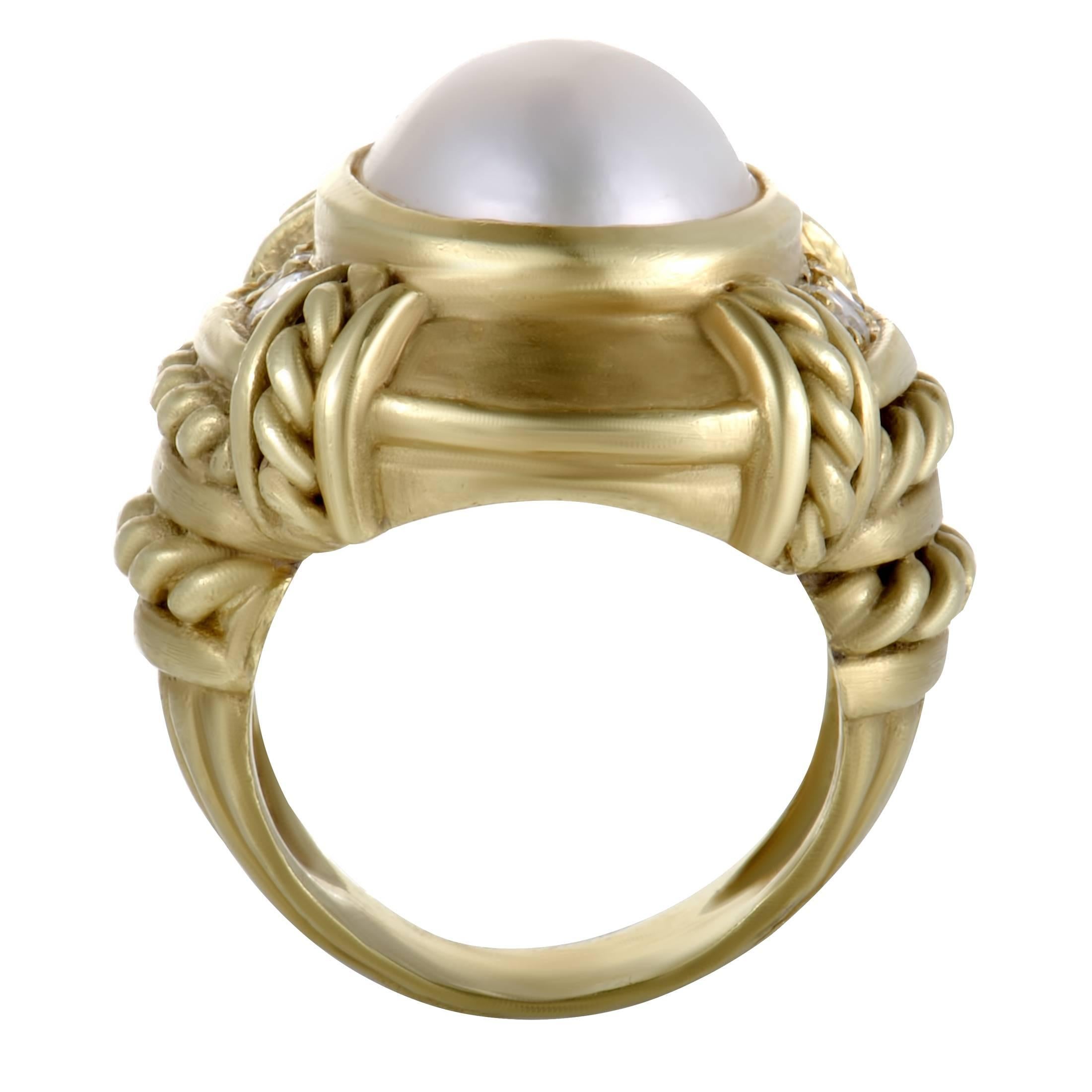 Nifty woven segments give an attractive aesthetic twist to this statement piece designed by Judith Ripka. The ring is made of 18K yellow gold and decorated with a sublime mabe pearl and 0.35 carats of glistening diamonds.
Ring Size: 6
Band