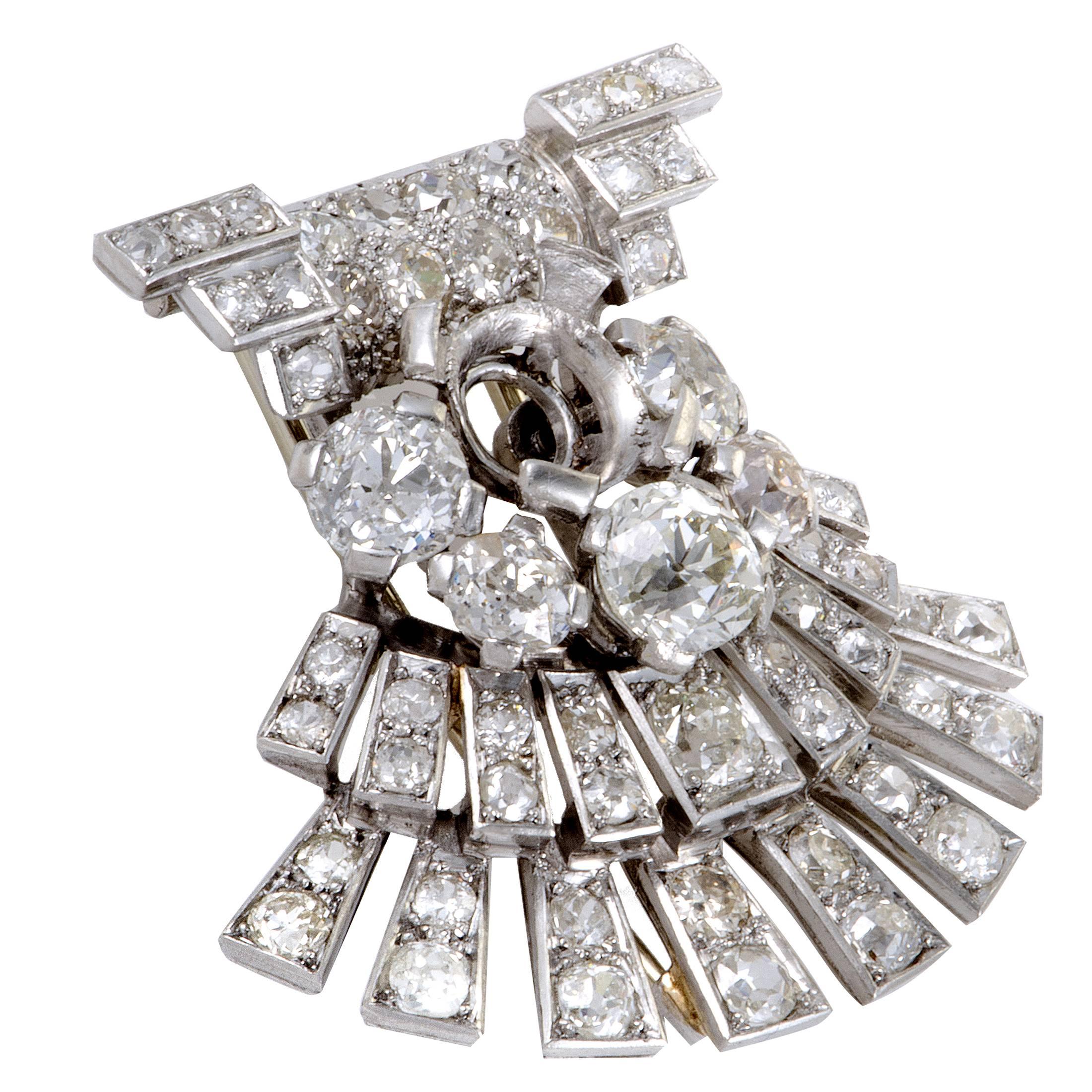 Offering a look of utmost luxury and glamour, this fascinating antique brooch is a must-have for any high-end jewelry collection. The brooch is made of prestigious platinum and set with a plethora of resplendent diamonds that total 7.50 carats.
