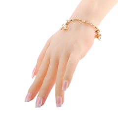 Cartier Panther-Charm-Armband aus Gelbgold mit Diamanten, Rubinen und Smaragden