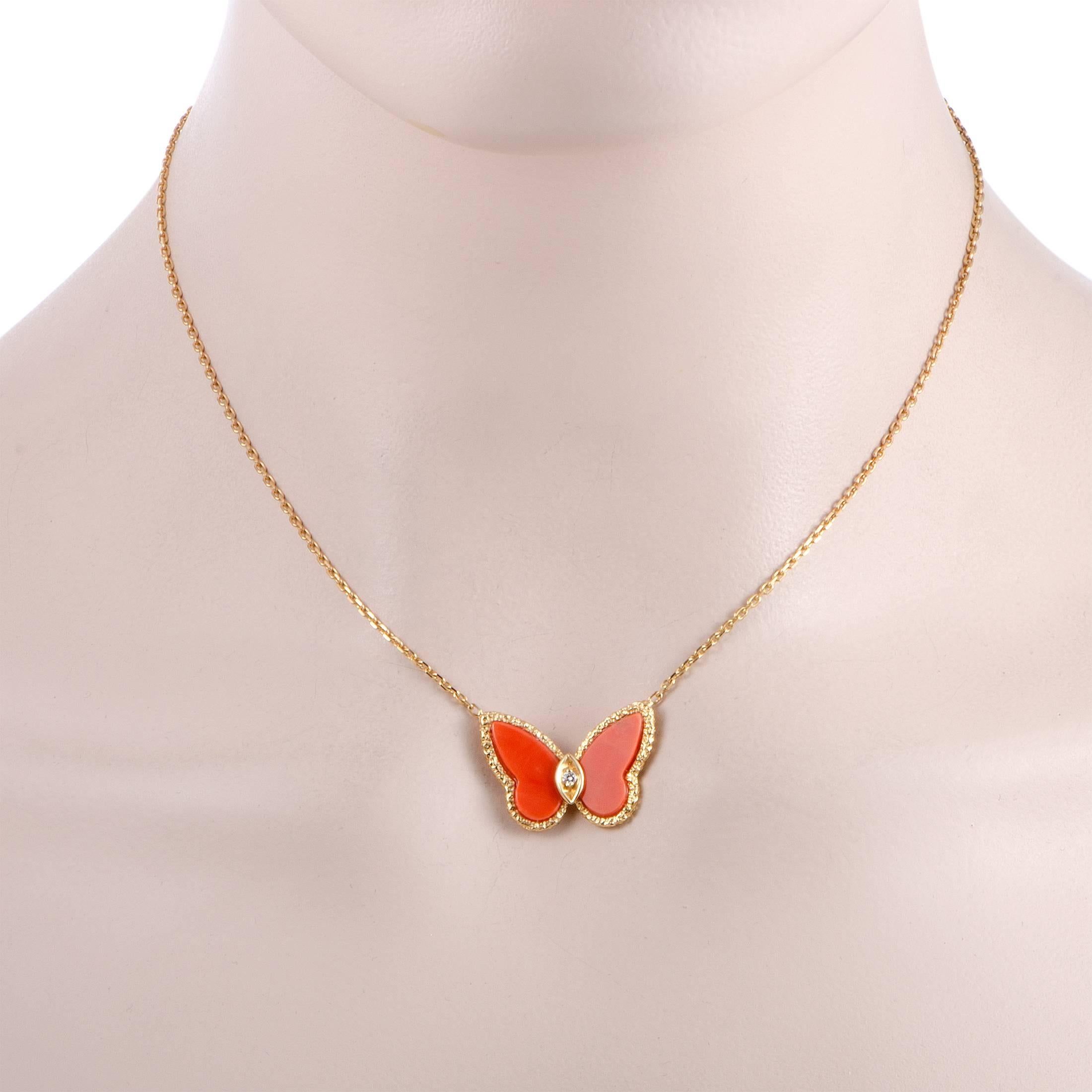 Incredibly eye-catching and feminine, this splendid vintage necklace designed by Van Cleef & Arpels boasts a delightfully elegant appeal. The necklace is made of radiant 18K yellow gold and features a dainty butterfly pendant set with corals and a