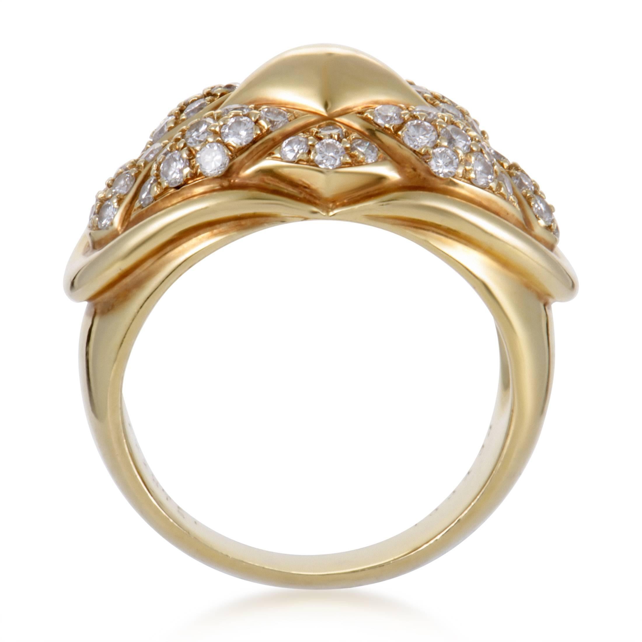 The allure of 18K yellow gold and diamonds is presented at its finest in this fabulous ring designed by Chaumet that boasts an incredibly glamorous appeal. The ring weighs 10.6 grams and the diamonds total 0.65 carats.
Ring Size: 6.75
Ring Top