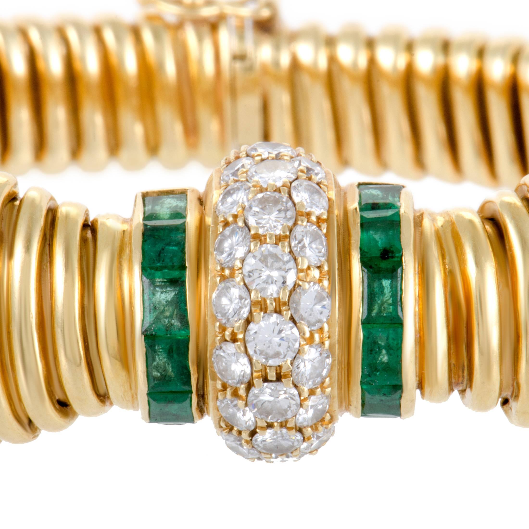 An exceptionally appealing piece, this sublime bracelet designed by Cartier is an item of immense aesthetic value. The bracelet has a flexible design, and is made of 18K yellow gold and embellished with 1.00 carat of emeralds and approximately 1.10