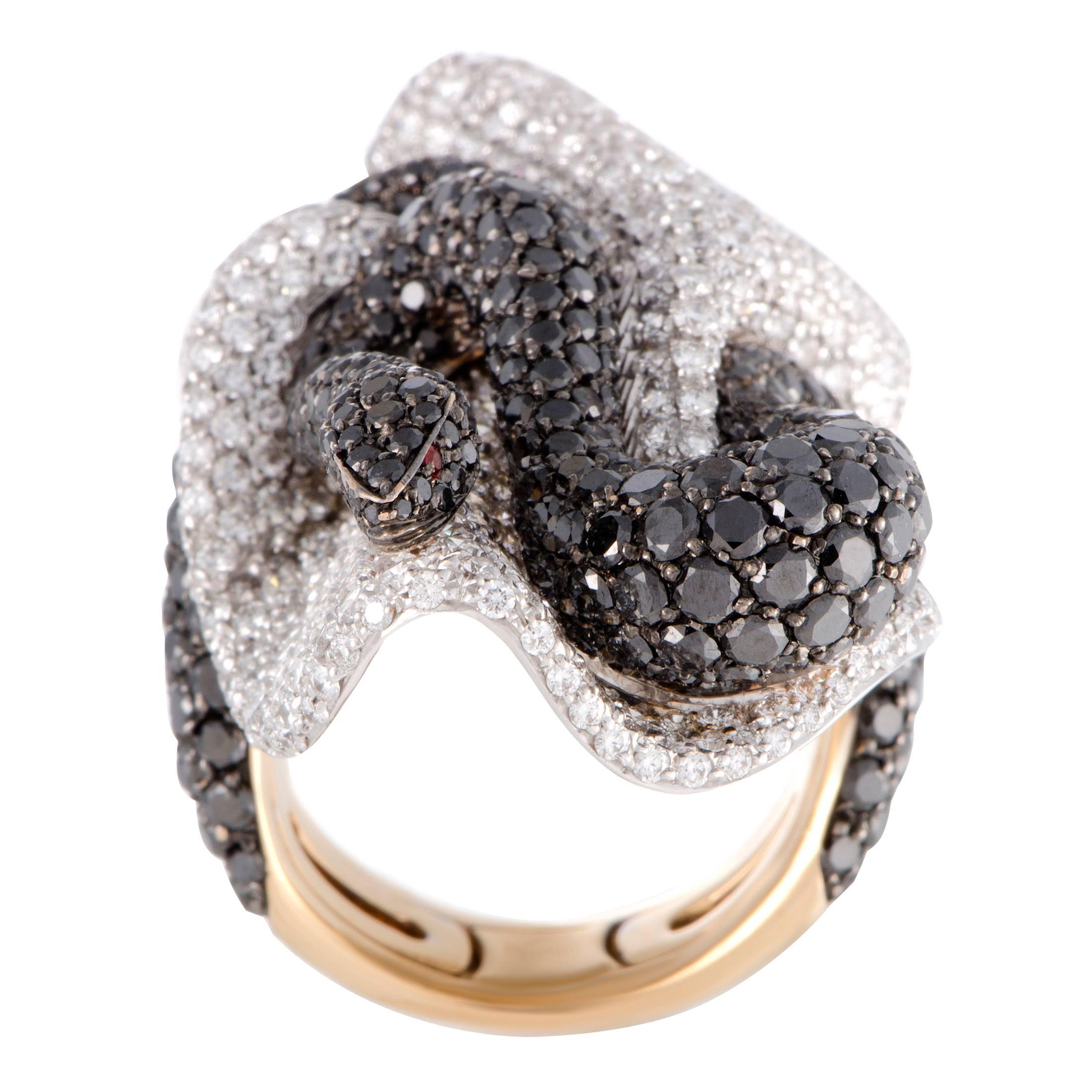 A diamond-paved snake marvelously stands out against bright backdrop in this superb ring designed by Palmiero. Made of 18K white and rose gold, the ring is paved with white diamonds, while the snake is paved with black diamonds and also features two