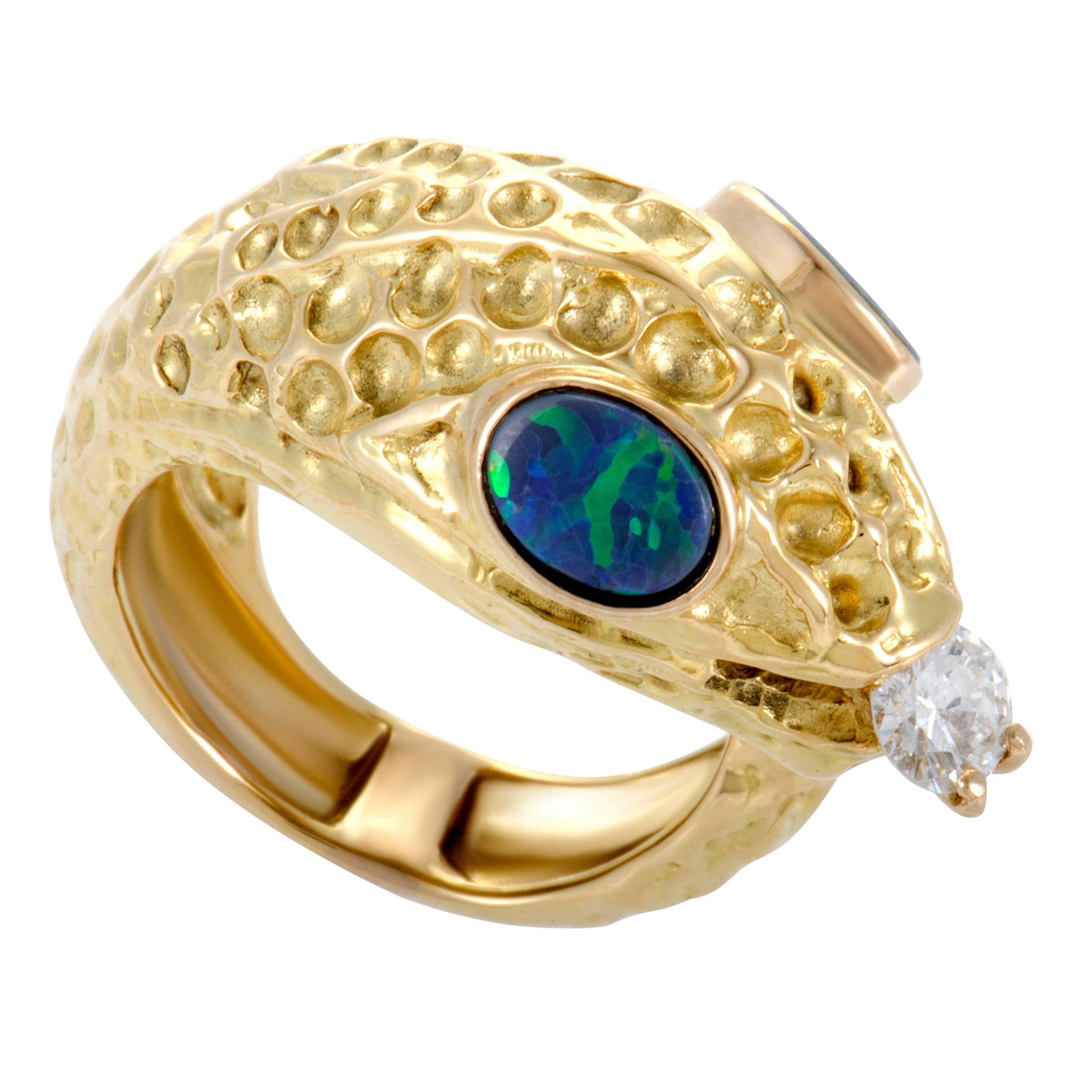 Magnificently depicting a snake, an animal that’s had many meanings throughout history - from rebirth to guardianship, this fascinating ring offers an exceptionally compelling appearance. The ring is made of 18K yellow gold and it is embellished