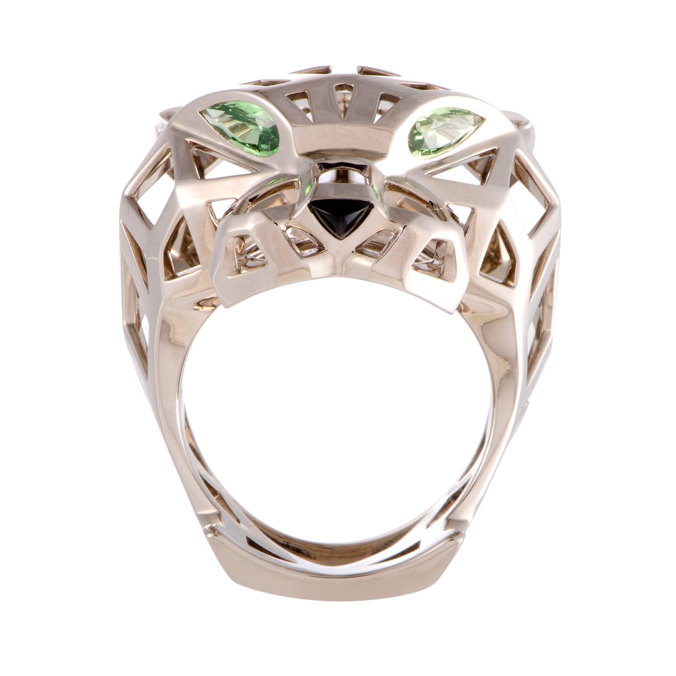 Presented within the iconic “Panthère de Cartier” collection with designs inspired by Cartier’s symbolic animal that can be both fierce and playful, this stunning ring boasts an incredibly masculine appeal. The ring is made of 18K white gold and