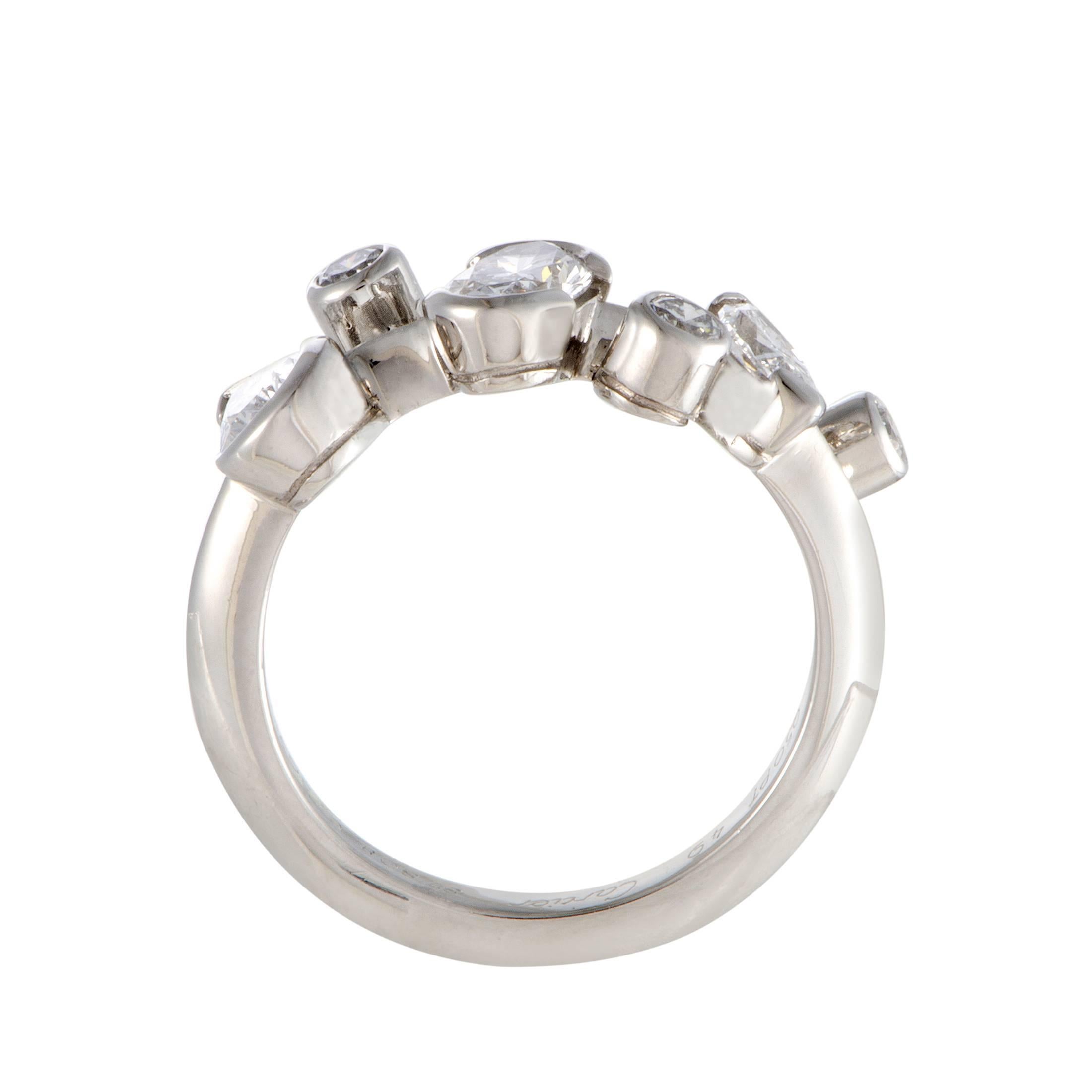 Exceptionally feminine, with a nifty elegant feel, this dainty ring is made of prestigious platinum and offers a delightfully classy appearance. The ring is decorated with diversely cut diamond stones of EF color and VVS clarity that weigh in total