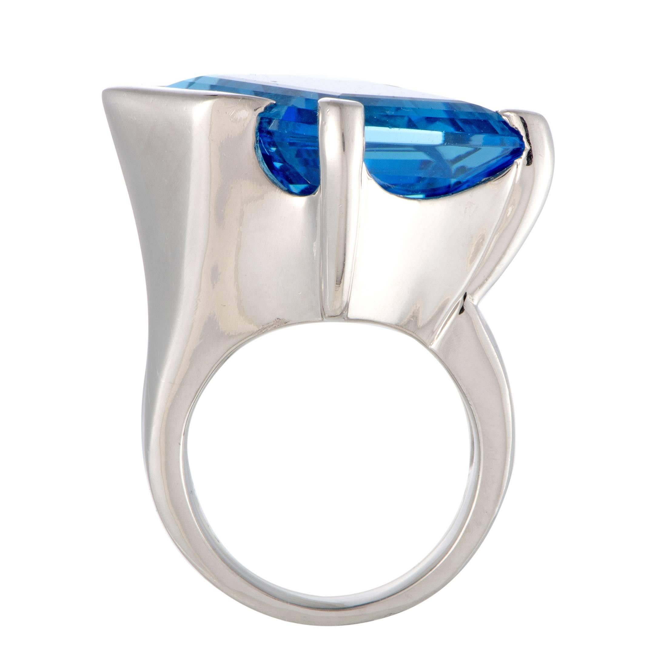 The ingeniously cut topaz steals the show in this stunning ring that offers an exceptionally eye-catching, fashionable look. The ring is made of elegant platinum and weighs 43.7 grams, and the topaz weighs 42.19 carats.
Ring Size: 7
Ring Top