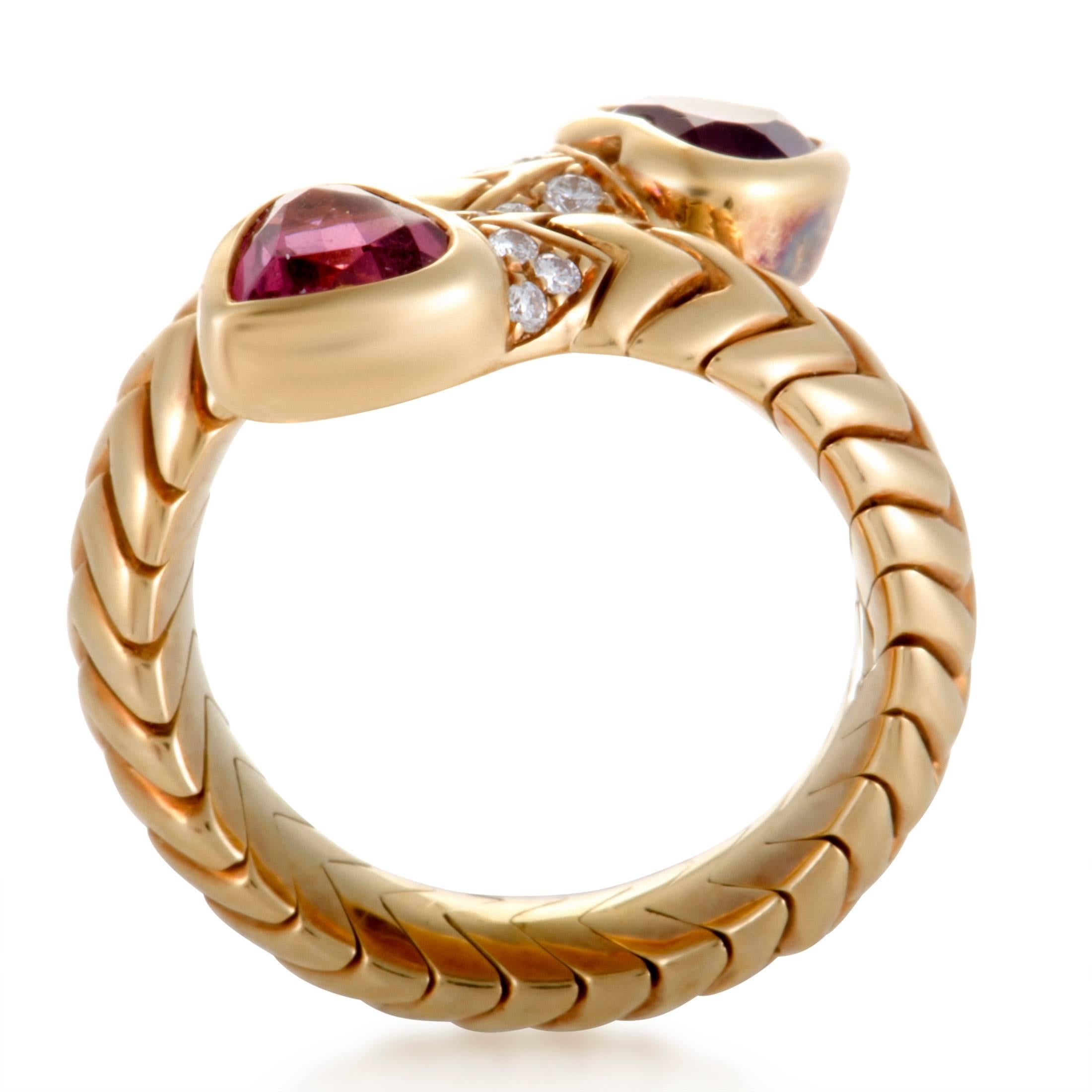 Brilliantly crafted in shimmering 18K yellow gold, this beautiful ring by Bvlgari is absolutely exemplary in design and style. The stunning ring is adorned in dazzling diamonds, an exquisite amethyst and a sparkling tourmaline stone that immensely