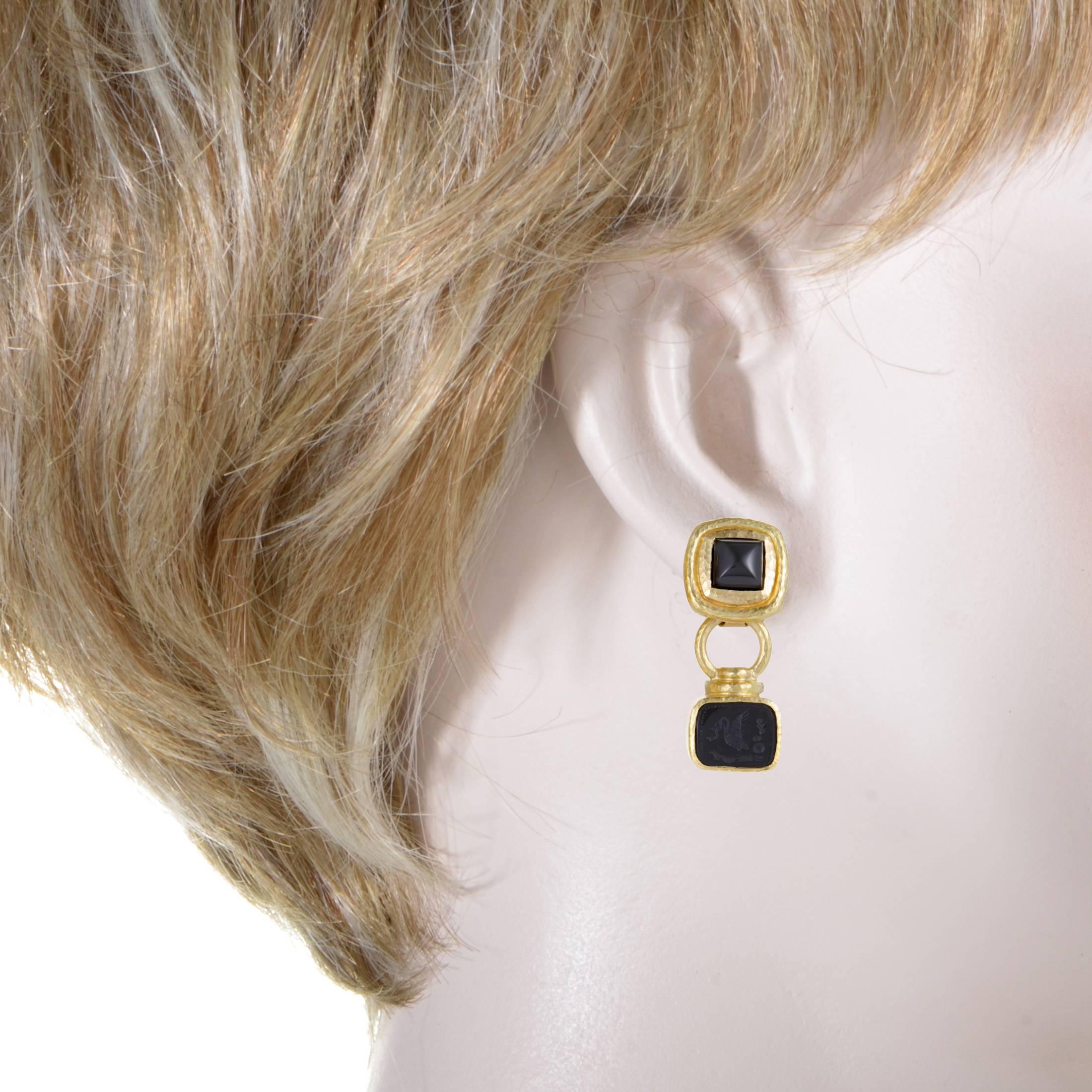 These superb earrings are designed by Elizabeth Locke and feature bold, eye-catching appearance with a distinct fashionable appeal. The pair is made of prestigious 19K gold and embellished with striking onyx stones.