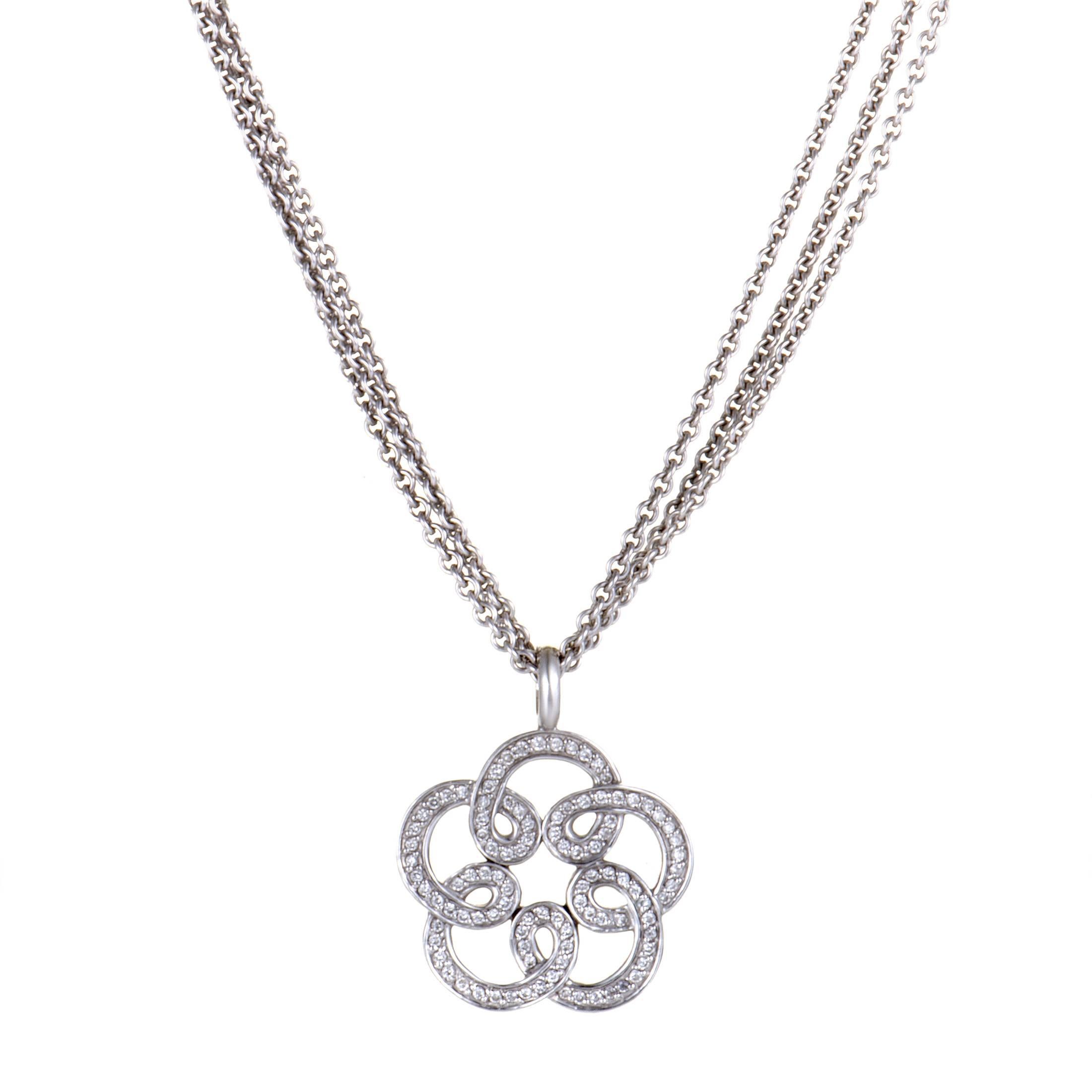 Made of 18K white gold and featuring graceful feminine design and tastefully subtle diamond décor, this Tous necklace boasts an exceptionally stylish appeal. The necklace weighs 22.3 grams and boasts a total of 0.85 carats of diamonds.
Pendant