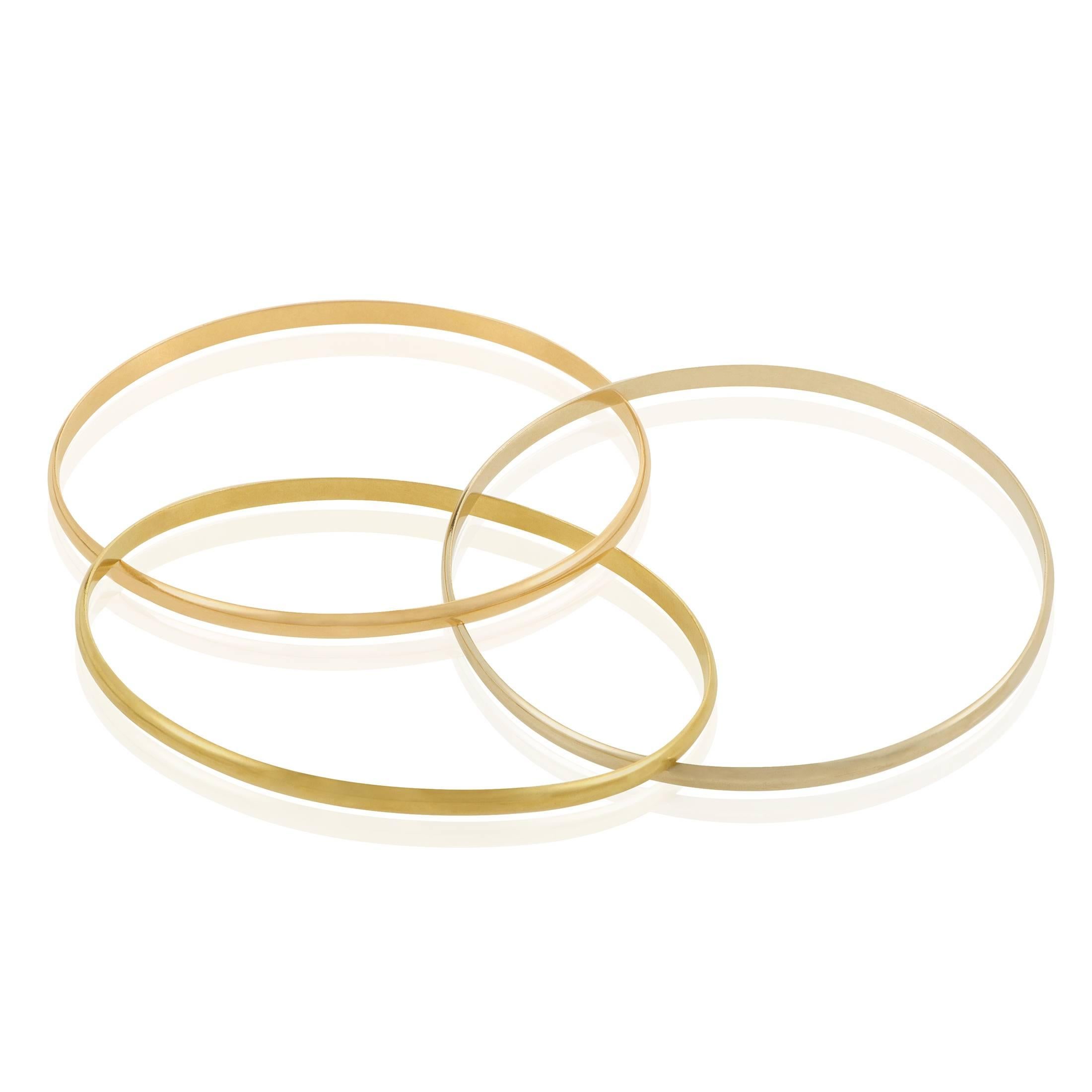 Cartier Trinity Yellow White and Rose Gold Rolling Bangle Bracelet In Excellent Condition In Southampton, PA