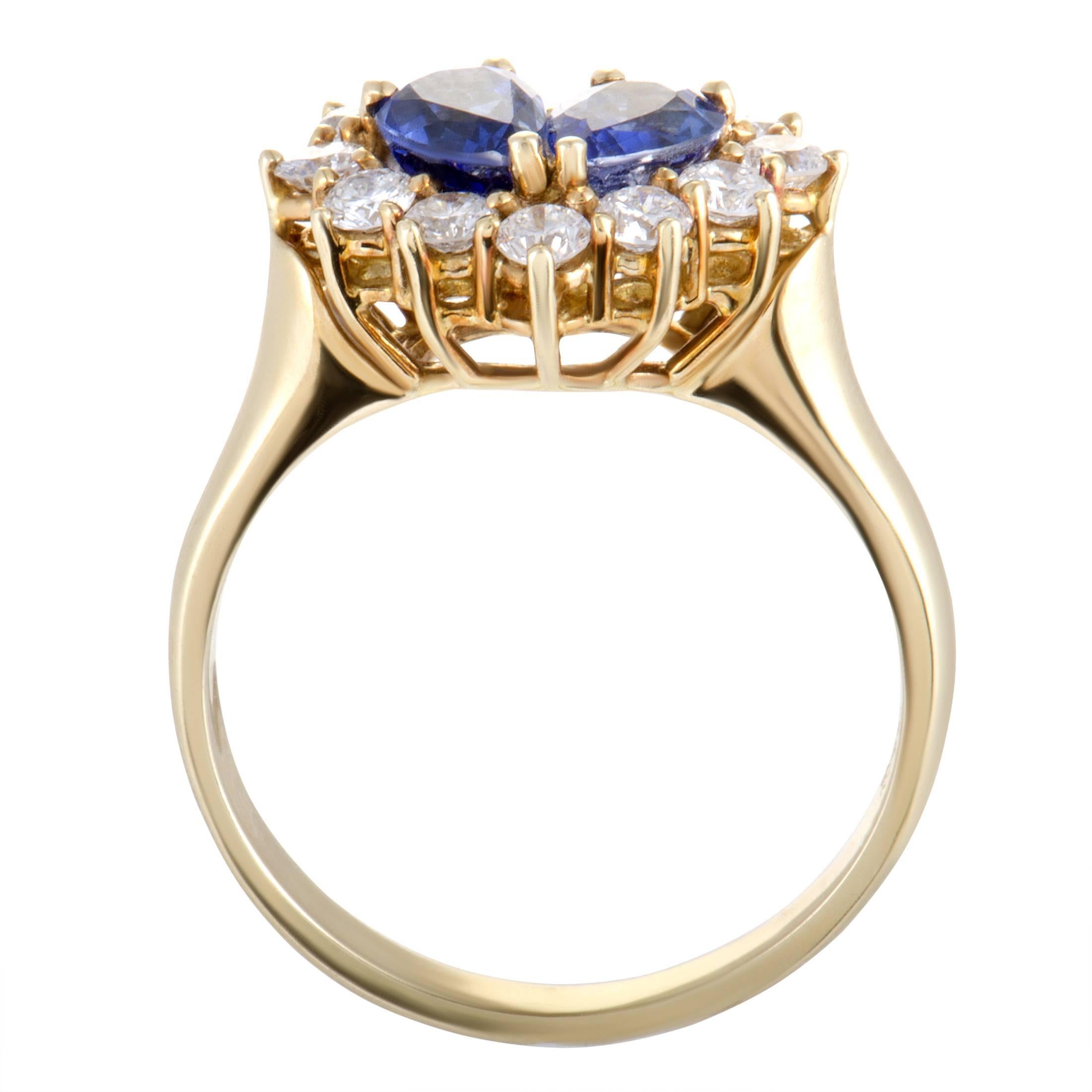 Perfect even for the most glamorous events, this vintage ring designed by Graff is made of classy 18K yellow gold and decorated with a luxurious blend of diamond and sapphire stones. The sapphires weigh in total 1.00 carat, and the diamonds