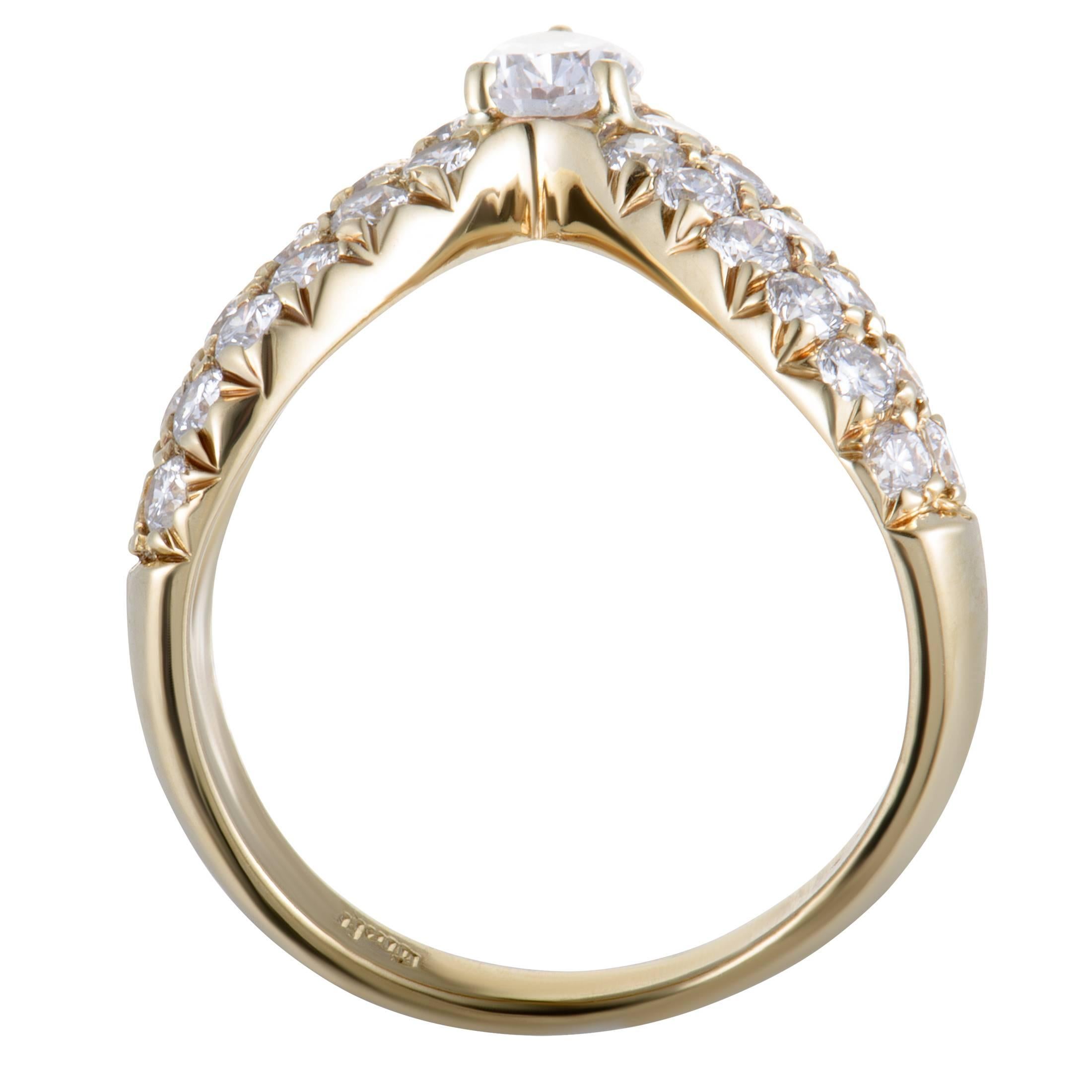 Give a distinctly prestigious tone to your look with this splendid ring, a Graff design marvelously crafted from elegant 18K yellow gold. The ring is lavishly set with colorless (grade F) diamonds of VS1 clarity that weigh approximately 1.25 carats