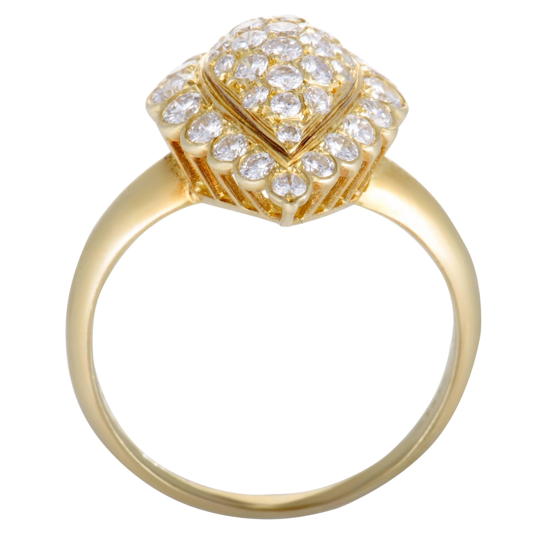 The exquisitely refined design and the resplendent diamond décor give a sublime aesthetic appeal to this vintage Van Cleef & Arpels ring. Made of attractive 18K yellow gold, the ring is embellished with a total of 1.31 carats of diamonds.
Included