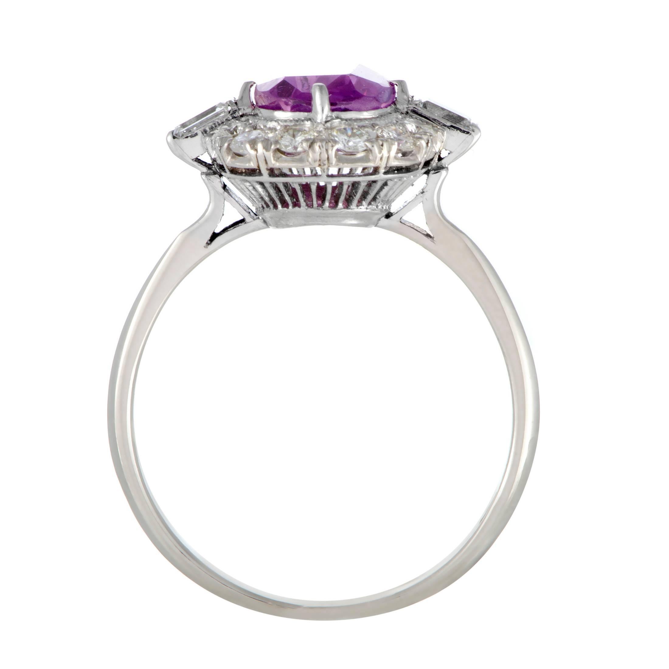 Exuding its vivacious color and feminine charm against the wonderful harmonious brightness of shimmering platinum and sparkling diamonds amounting to 0.60 carats, the gorgeous pink sapphire weighing 2.73 carats produces a fantastic visual presence