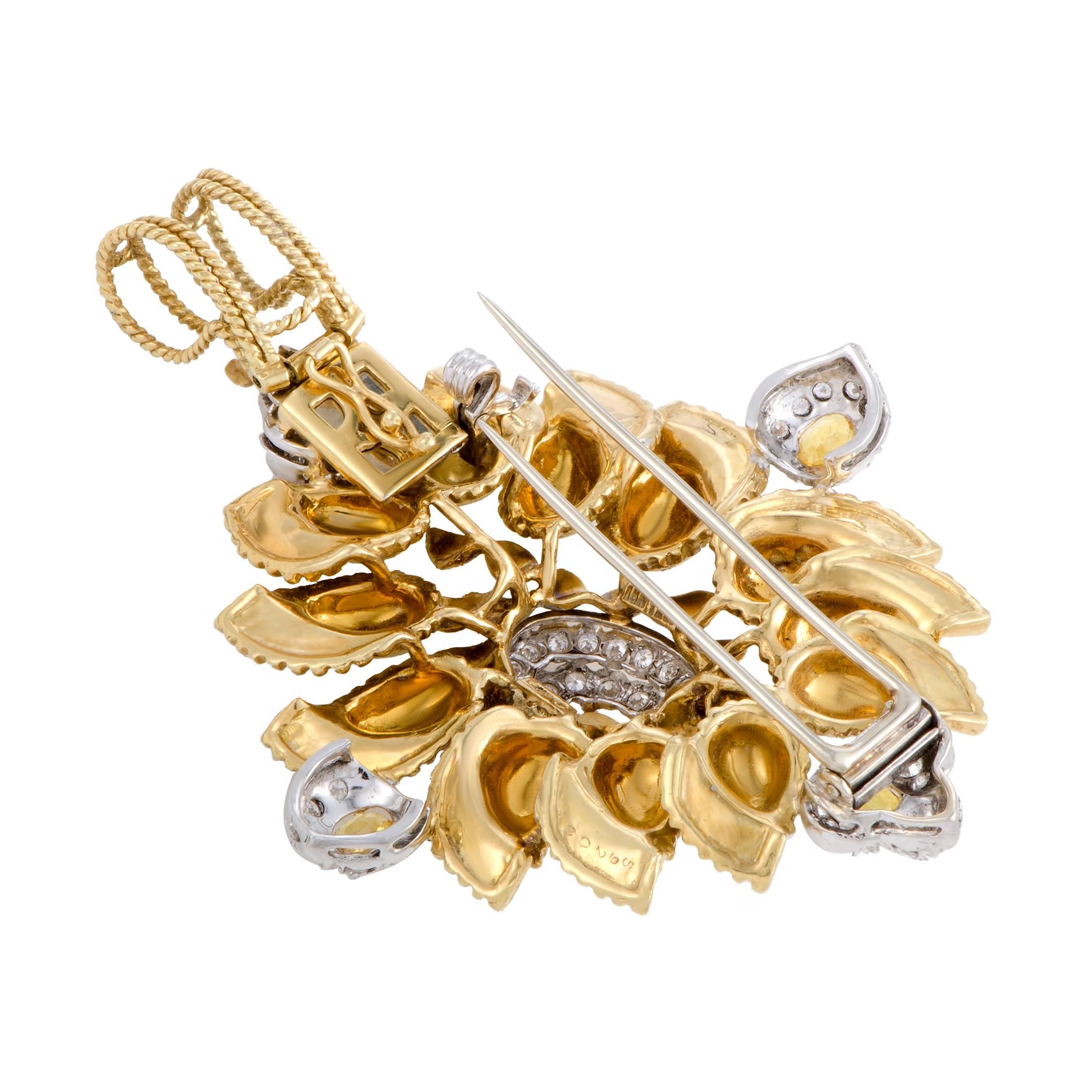 The spectacularly intricate design and the resplendent diamond décor give an incredibly luxurious appeal to this stunning one-of-a-kind brooch from Cartier that can also be worn as a pendant. Made of 18K yellow and white gold, the brooch is