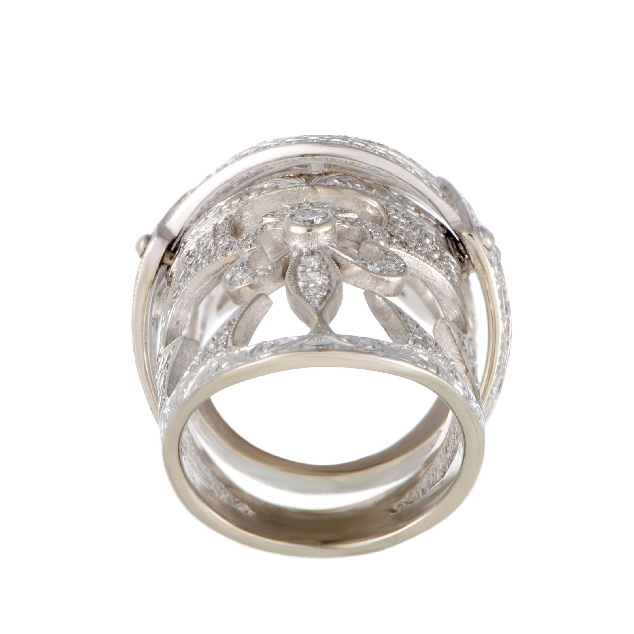 Presented by Loree Rodkin, whose extraordinarily designed pieces rarely fail to impress, this marvelous ring boasts an exceptionally attractive, fashionable appeal. The ring is made of 18K white gold and set with scintillating diamonds that weigh