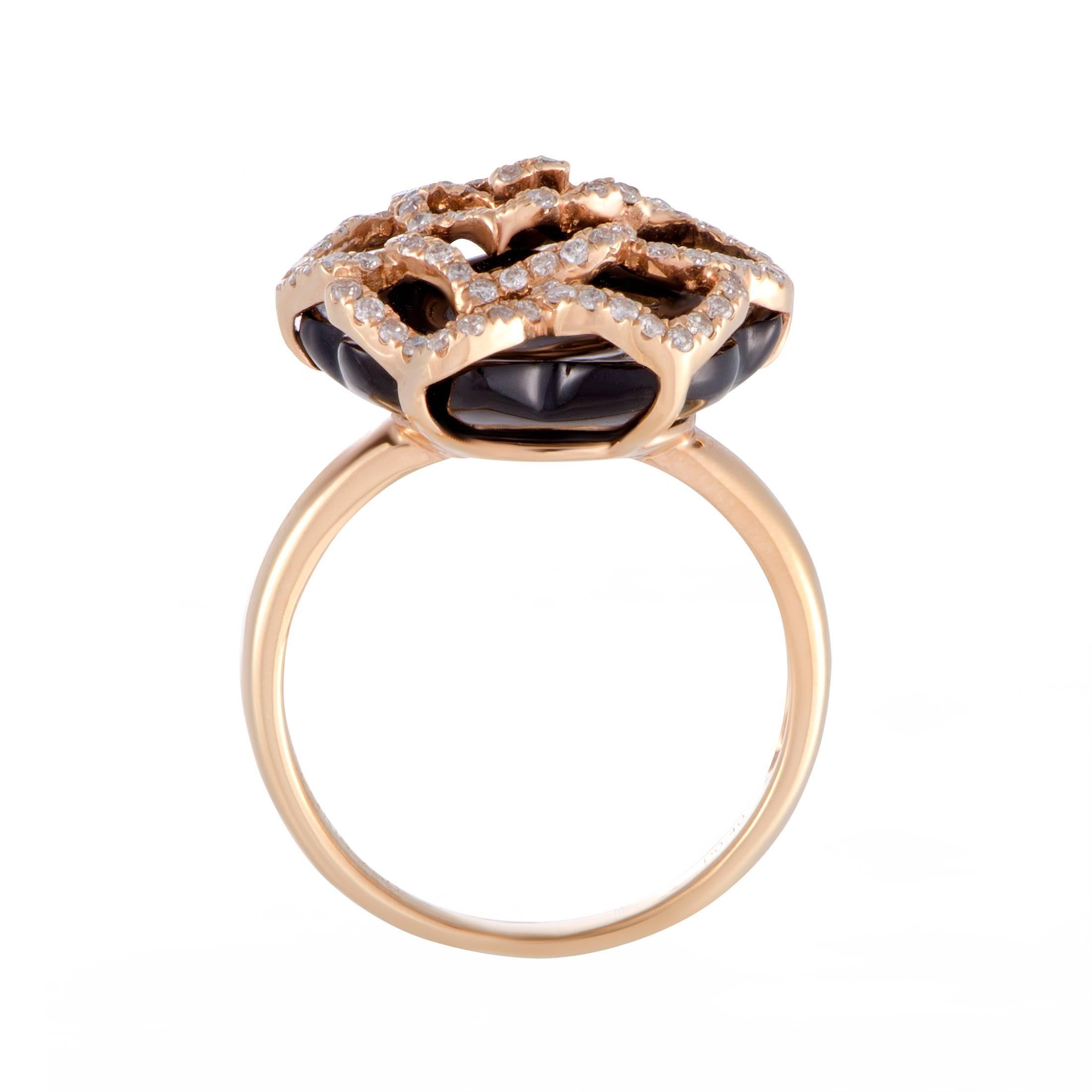 The endearingly feminine motif of a black onyx rose is marvelously presented in 18K rose gold in this sublime ring. Lastly, .40ct of diamonds give this divine piece of jewelry an exceptionally graceful appearance.
Ring Size: 6.75
Ring Top