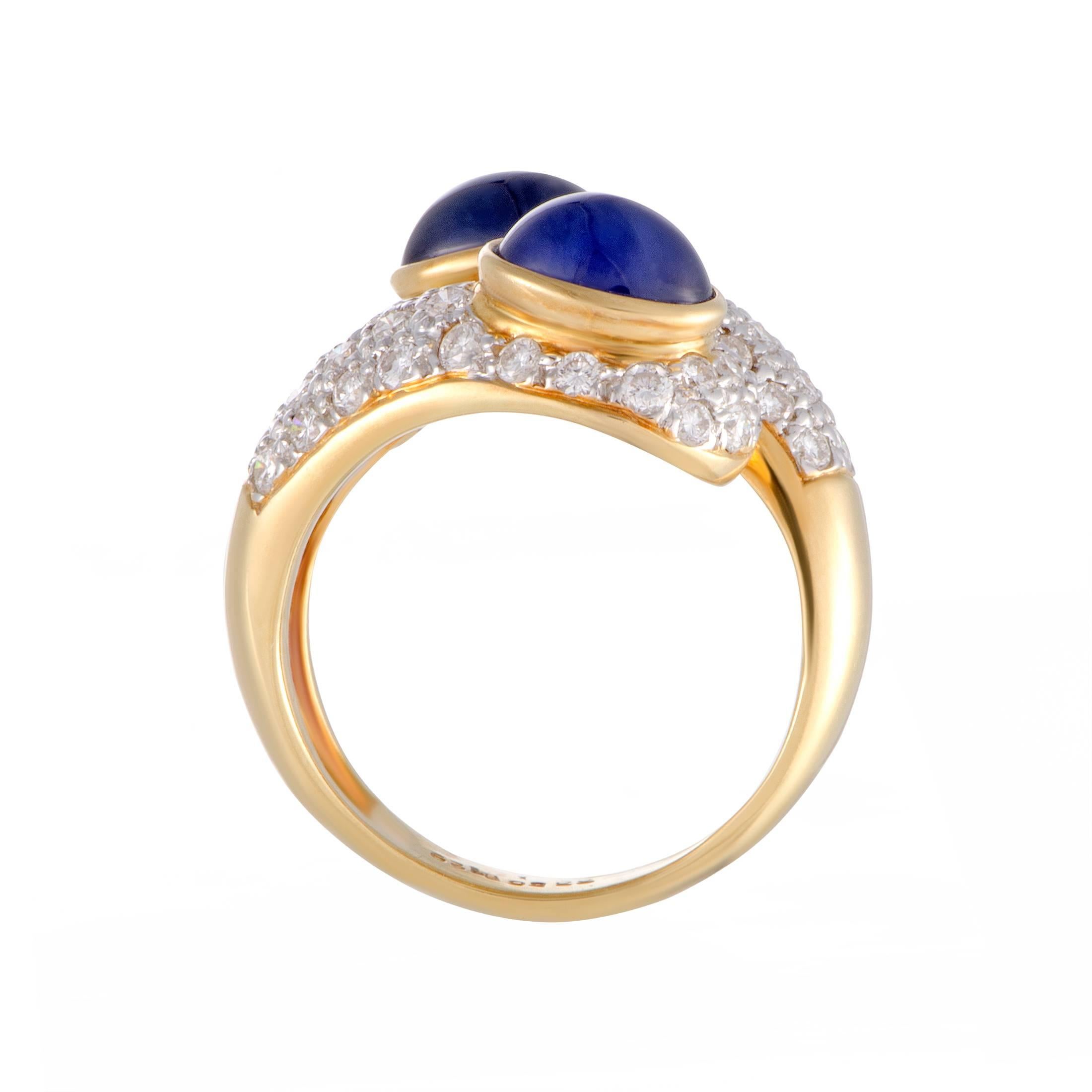 The luxurious blend of sapphires and diamonds is complemented in an exceptionally prestigious manner by the 18K yellow and white gold in this splendidly fashionable ring. The diamonds and sapphires weigh in total 1.29 and 3.56 carats