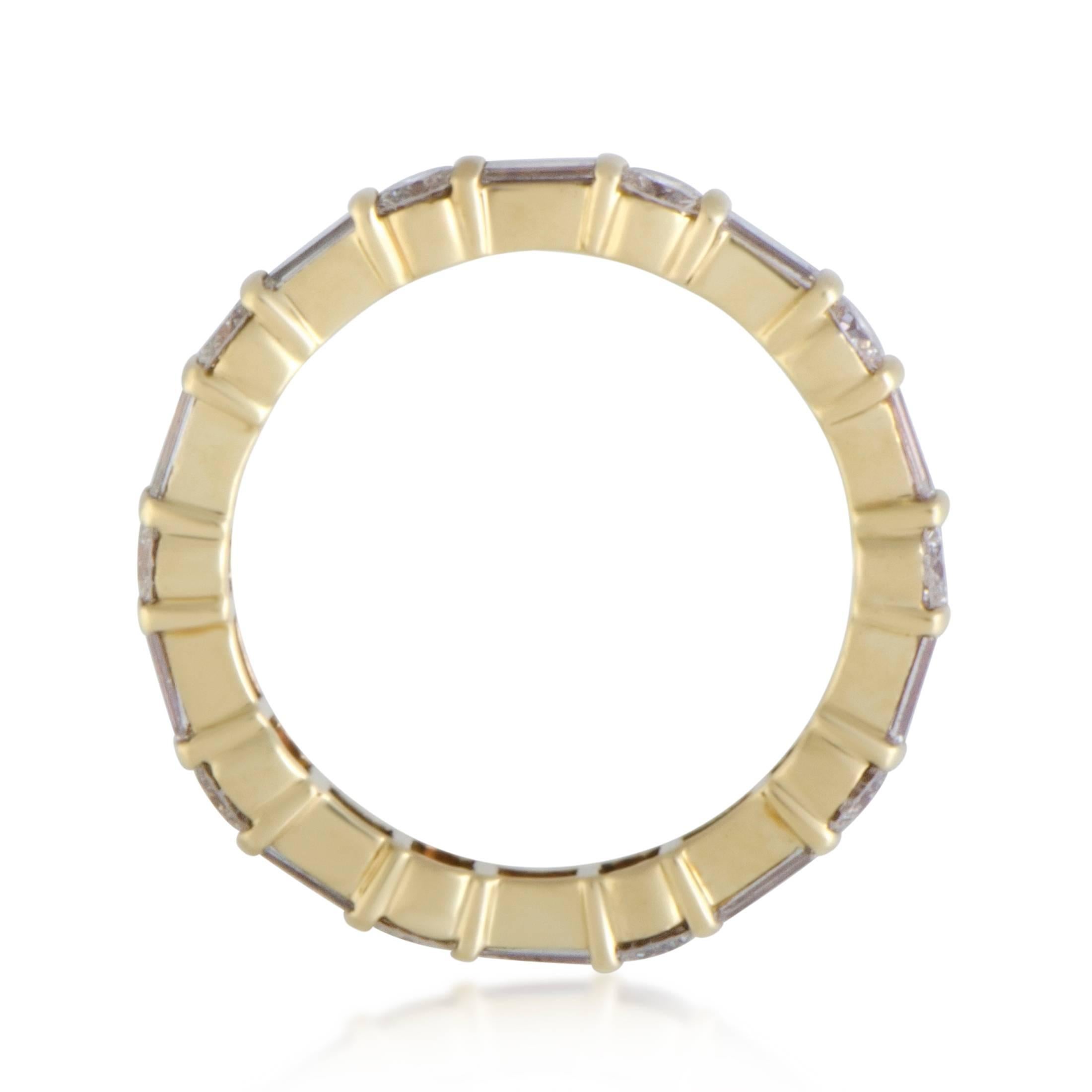 Honoring the brand’s renowned standards of quality and refinement, this fascinating eternity band from Van Cleef & Arpels is expertly made of enchanting 18K yellow gold and tastefully embellished with exquisitely cut diamonds weighing in total