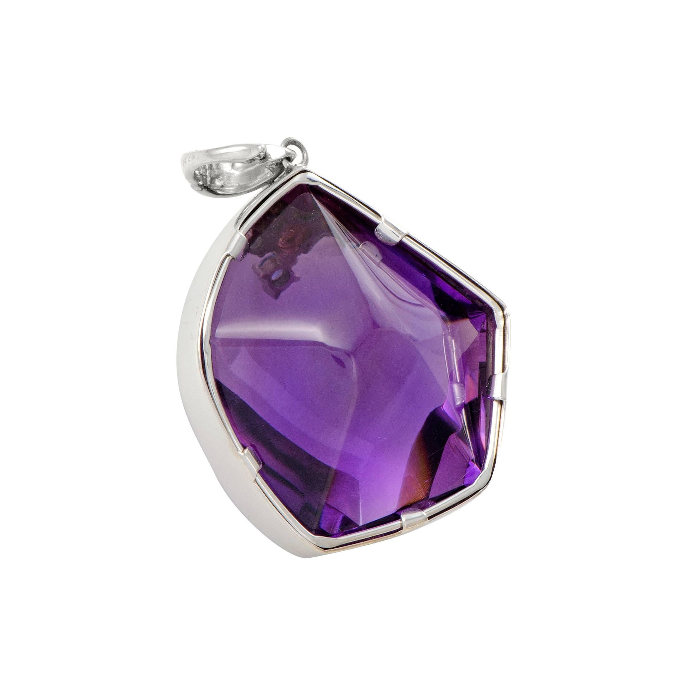 The superbly cut amethyst in this ravishing 18K white gold pendant is gorgeously accompanied by nifty topaz and pink tourmaline stones that add a colorful twist to the piece. The amethyst weighs astounding 106.20 carats.
Dimension 1.75