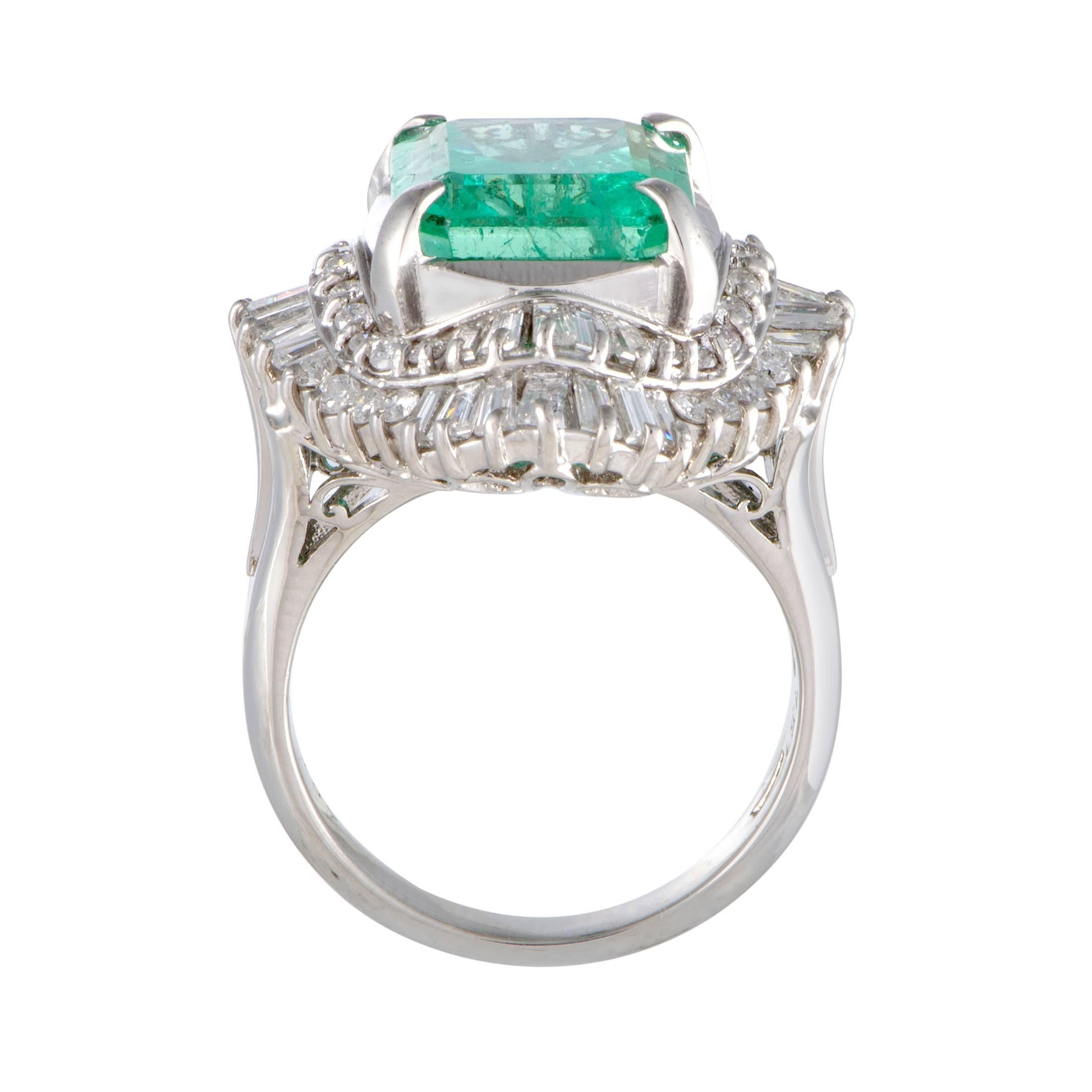Harmoniously combined, the endearingly bright tones of emerald and diamonds give a sublime aesthetic appeal to this stunning ring made of platinum. The emerald weighs astounding 7.51 carats and it is surrounded with 2.10 carats of resplendent