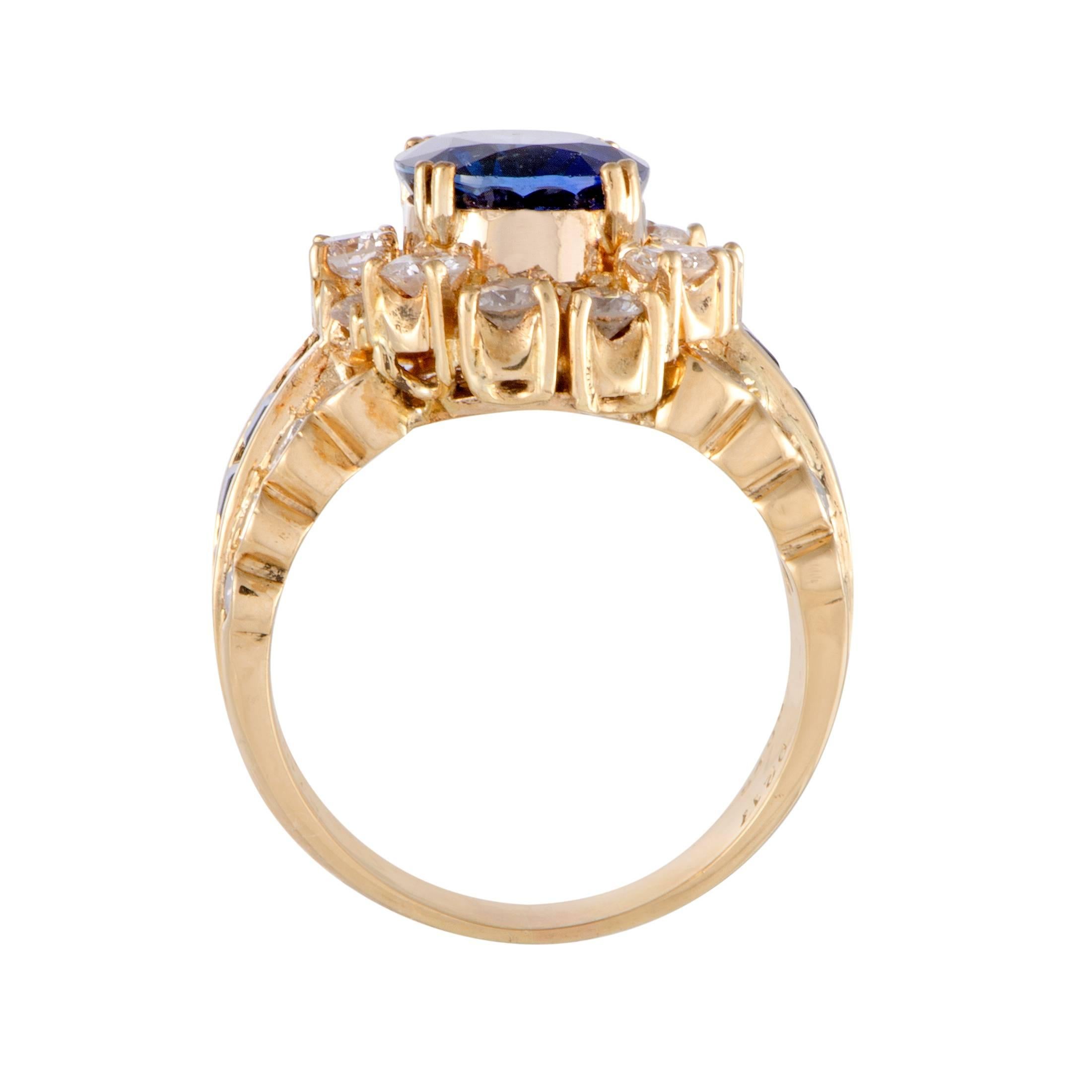 An embodiment of prestige and opulence, this spectacular ring is made of classy 18K yellow gold and lavishly decorated with regal sapphires and resplendent diamonds. The sapphires and diamonds weigh in total 1.02 and 2.17 carats respectively, while