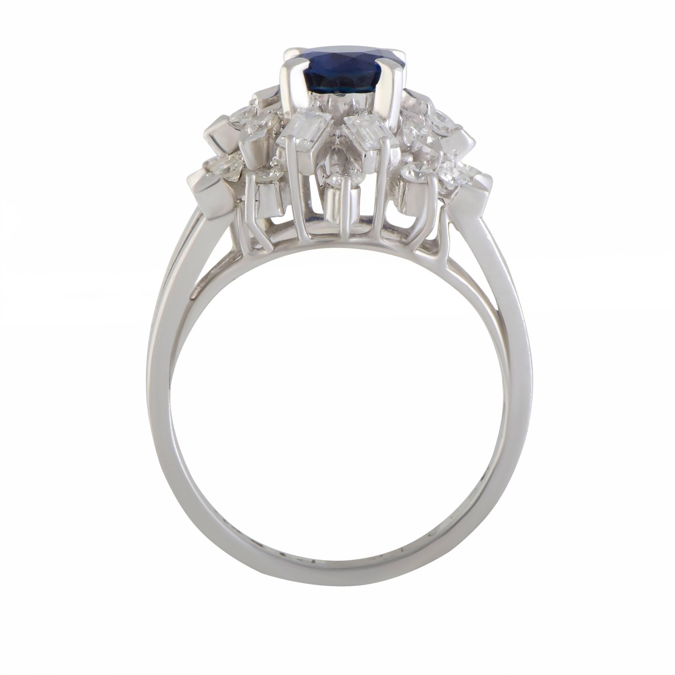 A look of absolute refinement is achieved in this sublime ring by combining luxuriously glistening diamonds and a regal sapphire and complementing them with prestigious platinum. The sapphire weighs 0.97 carats and the diamonds total 0.53