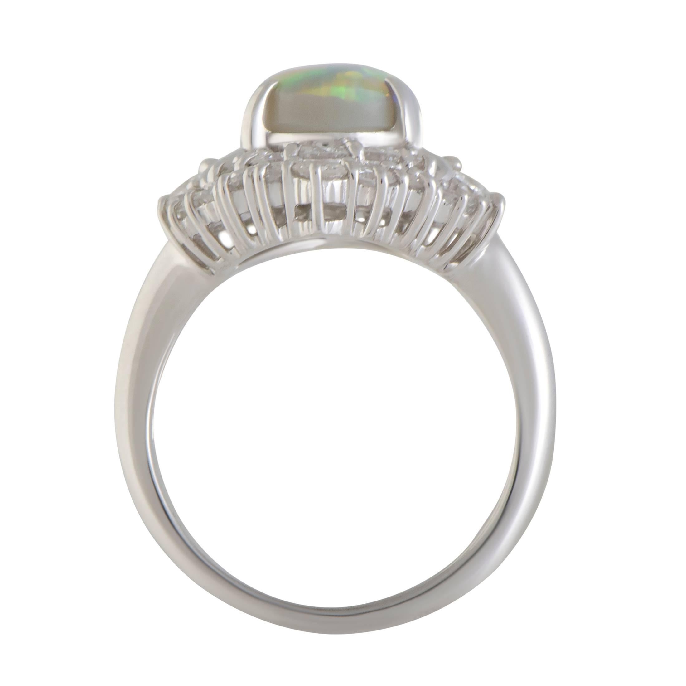 Featuring a gorgeously harmonious blend of platinum, diamonds and opal, this ring offers a wonderfully tasteful, classy appearance. The opal weighs 1.23 carats and it is accompanied by 0.86 carats of diamonds.
Ring Size 5
Band 2mm
Top 7mm
Dimension