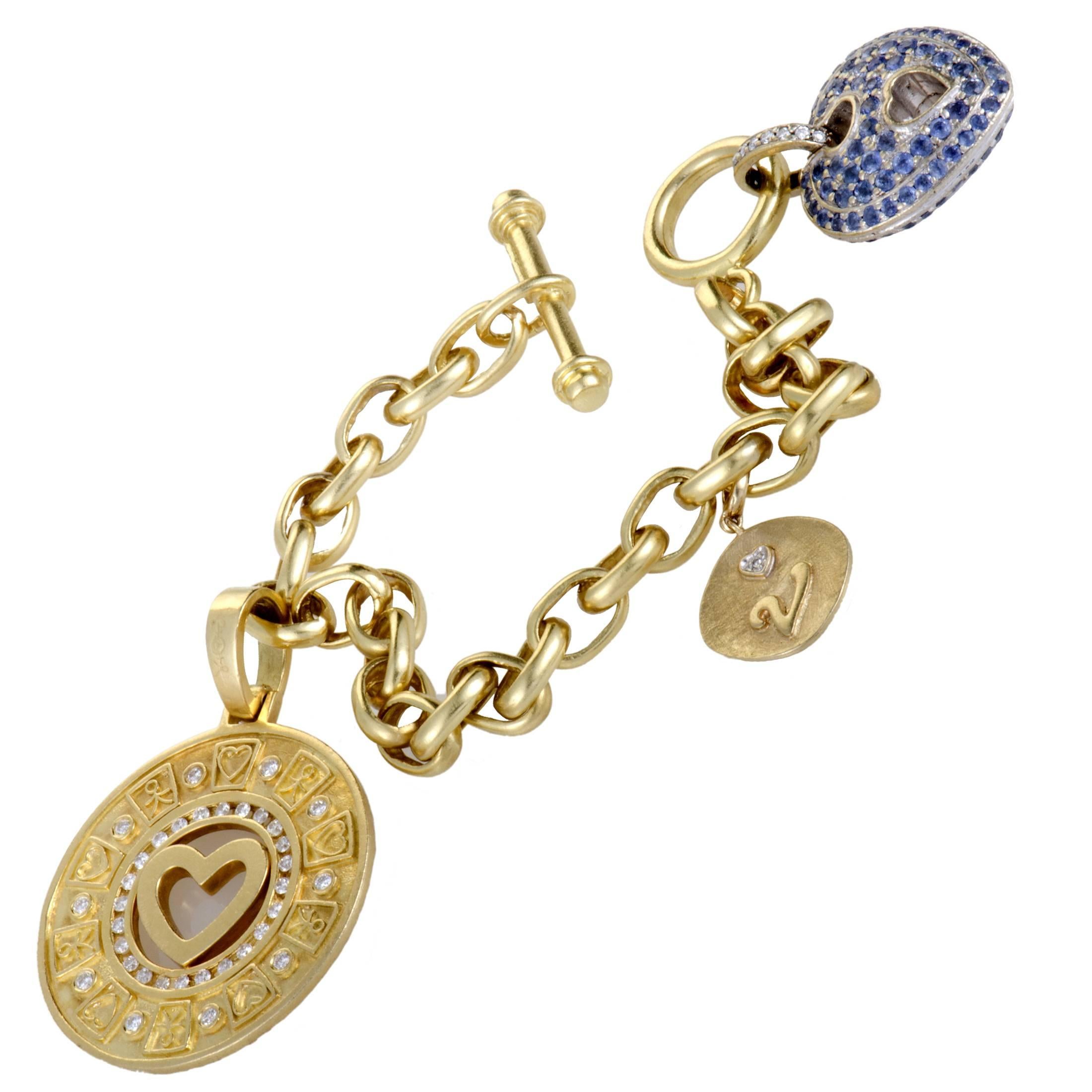 Boasting an incredibly feminine design and alluringly lavish décor, this splendid Marlene Stowe bracelet offers an exceptionally graceful, charming appearance. The bracelet is made of 18K yellow and white gold and set with a plethora of sapphires