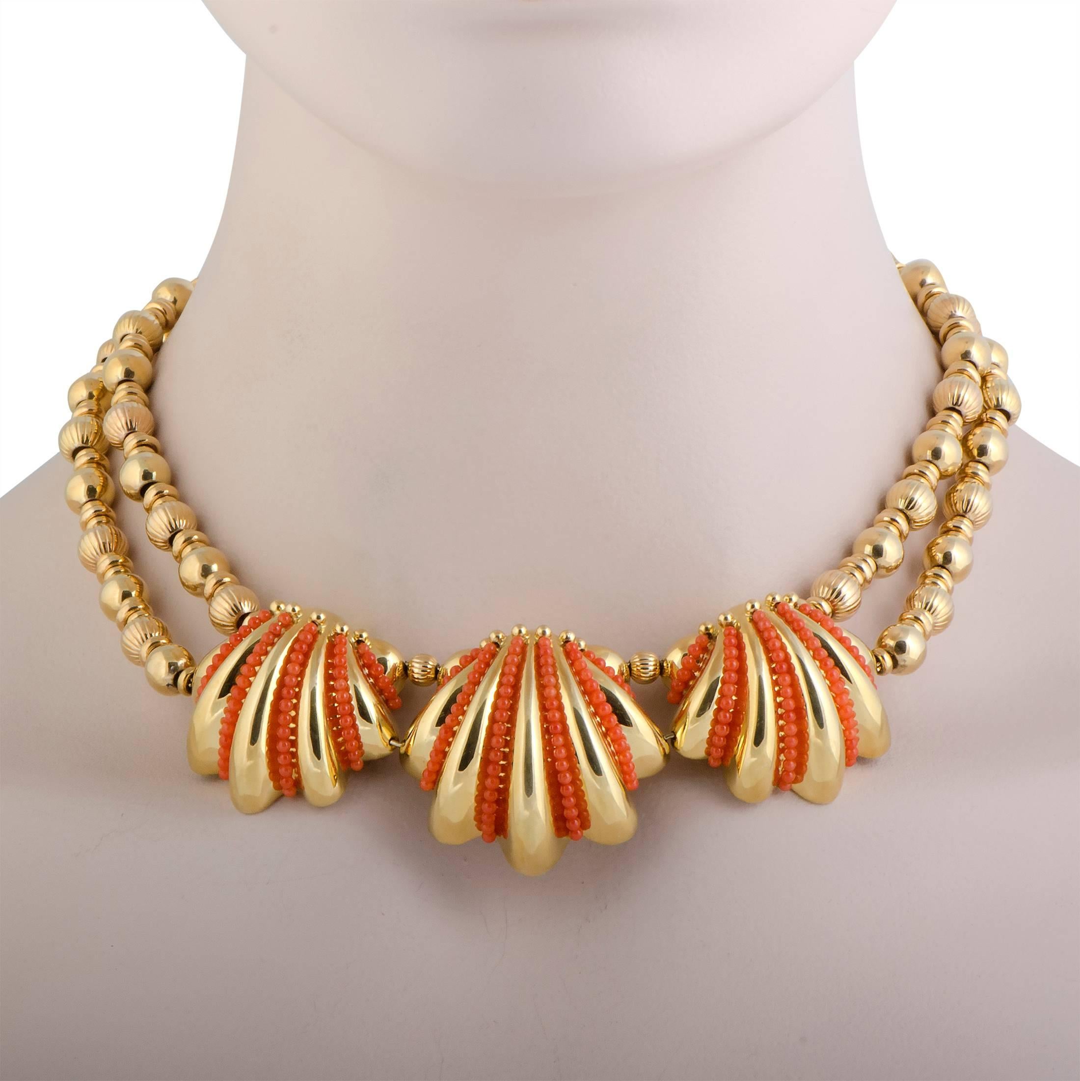 This glamorous necklace, attractively designed by Rossetti in 18K yellow gold, features a unique and alluring style. The extraordinary necklace includes coral embellishments in its incredible design that accentuate the charming appeal of the stylish