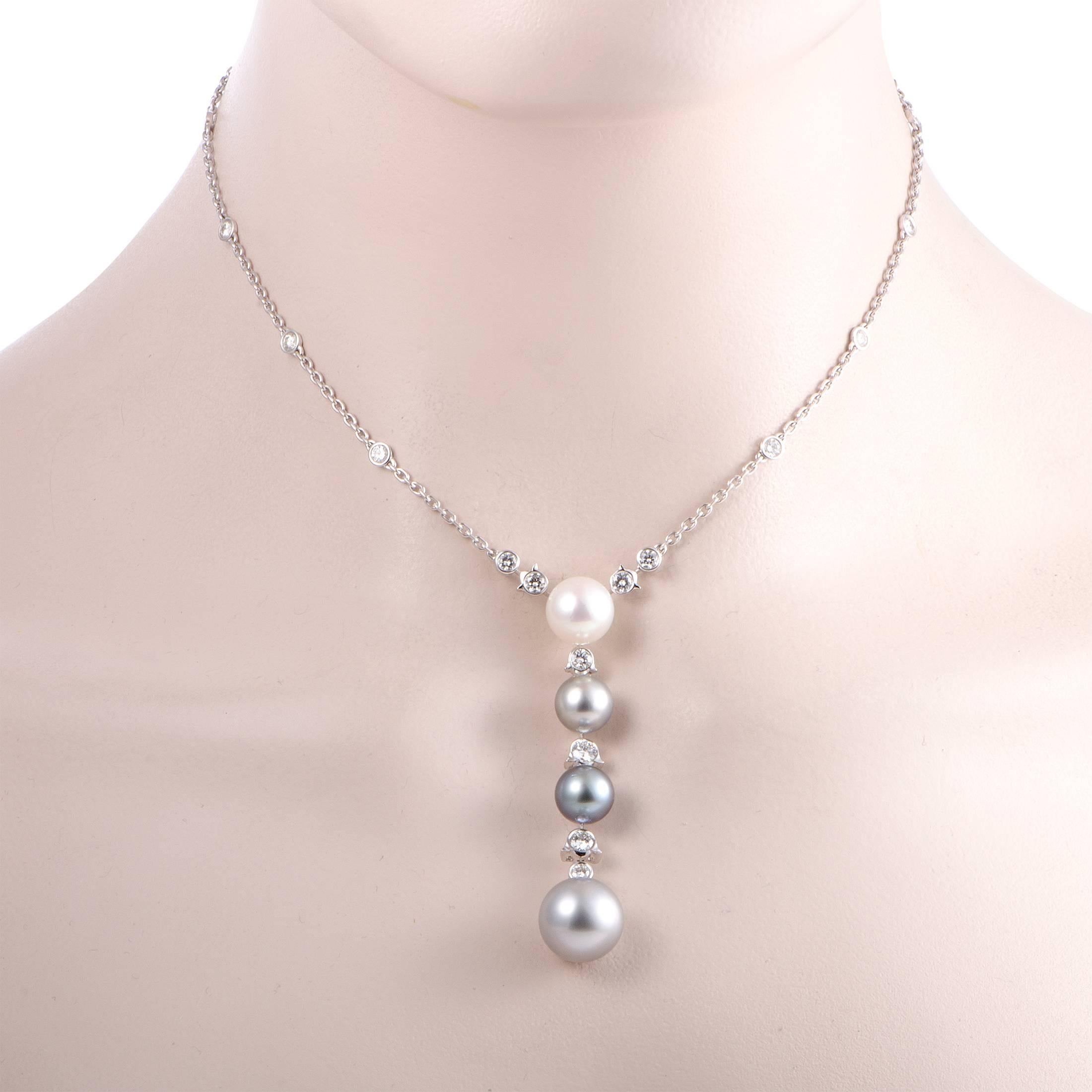 The sublime gleam of pearls is harmoniously complemented by the prestigious sheen of 18K white gold in this splendid necklace designed by Cartier. Apart from the pearls, the necklace is also embellished with scintillating diamonds that weigh 1.50
