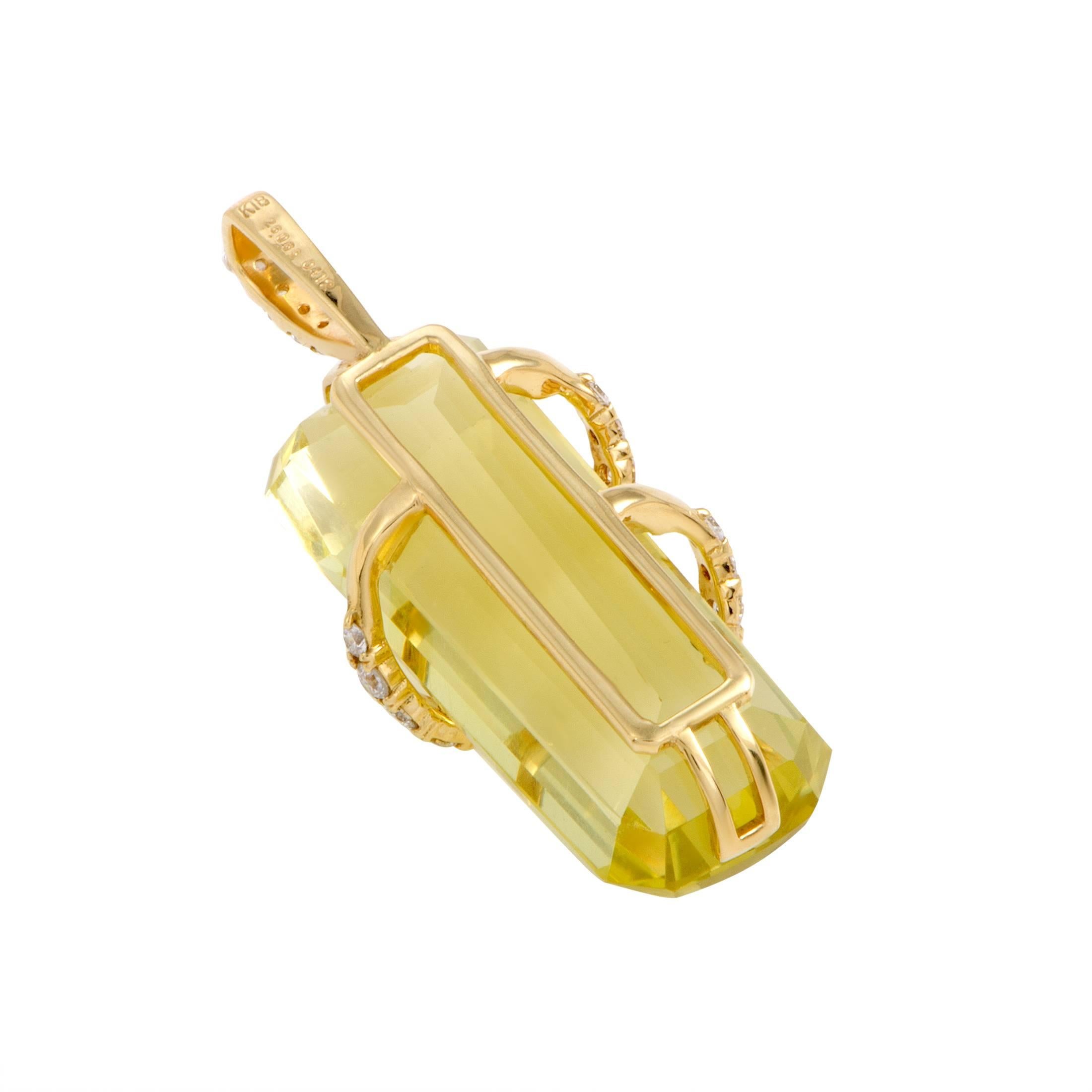 Crafted from radiant 18K yellow gold and set with a splendidly cut lemon citrine, this gorgeous pendant offers a delightfully vivacious, feminine appearance. The citrine weighs 26.06 carats and it is accentuated with glistening diamond stones that