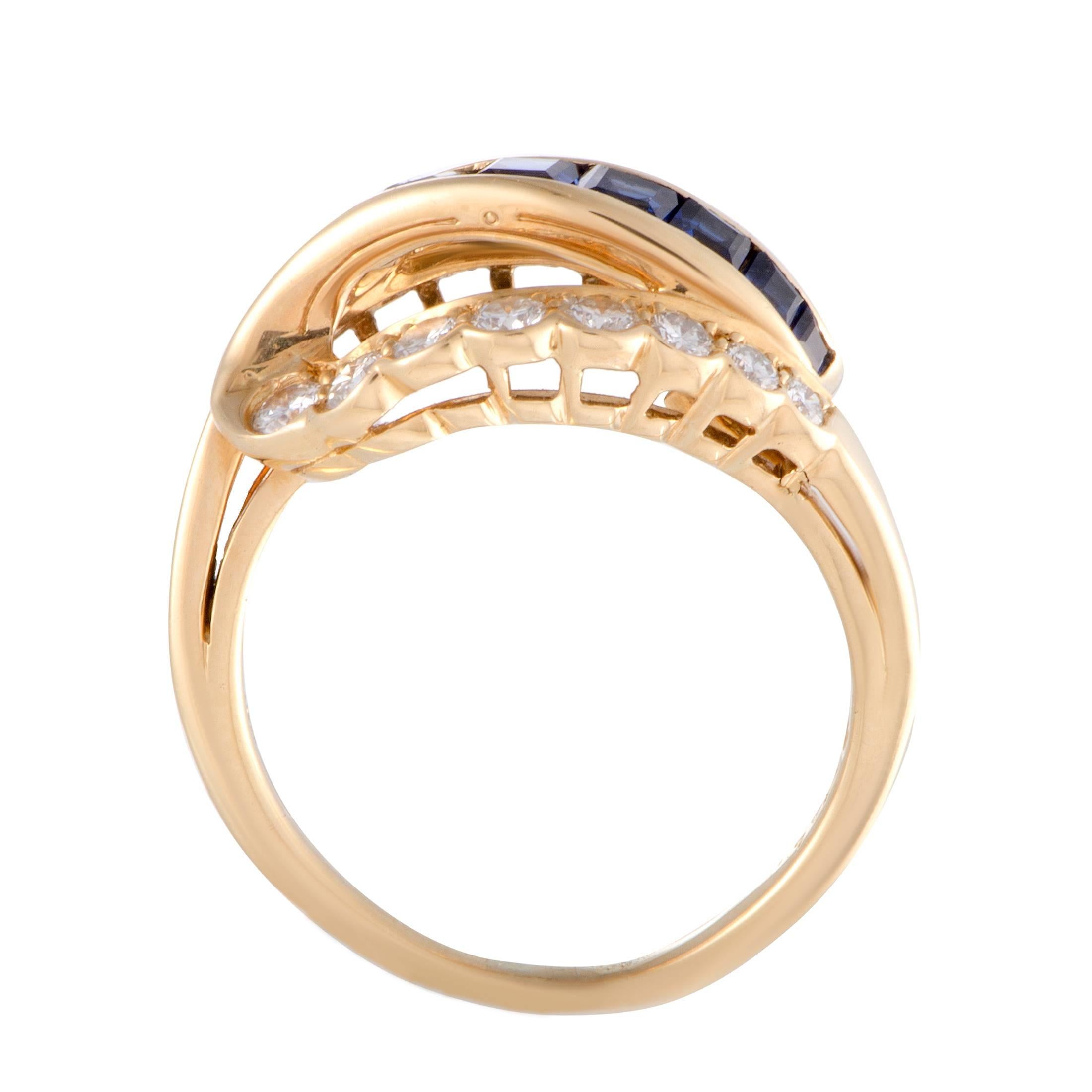 An endearingly refined appearance is achieved in this sublime Oscar Heyman ring by combining neat, classy design and tasteful décor. Made of 18K yellow gold, the ring is embellished with 0.75 carats of sapphires and approximately 0.65 carats of