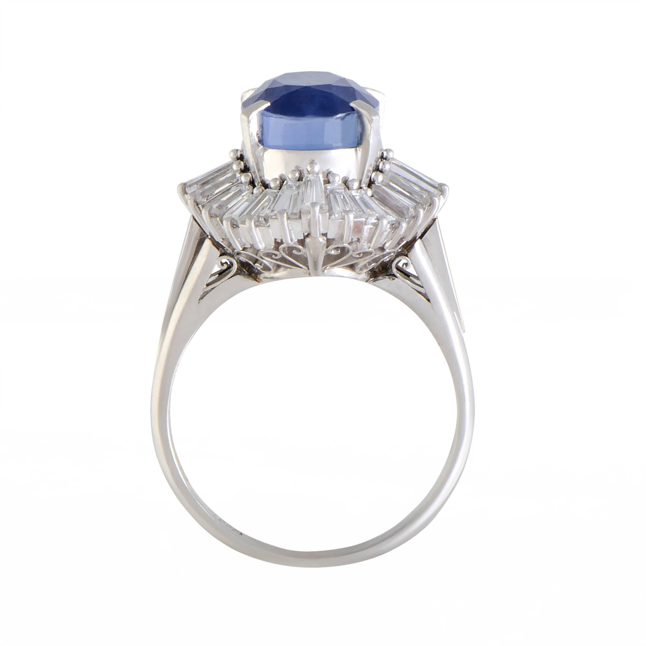 This gorgeous platinum ring features an enthralling design and compels with its feminine appeal. The beautiful ring has a 7.45ct alluring sapphire stone surrounded by 1.69ct of dazzling diamonds that immensely elevate the beauty of the remarkable