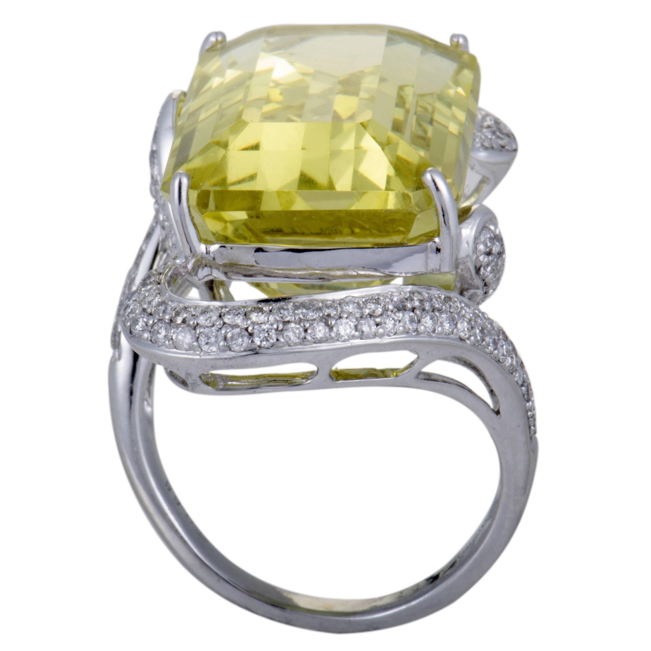 The alluring lemon citrine and the scintillating diamonds in combination with elegant 18K white gold give a splendidly harmonious appearance to this stunning cocktail ring. The citrine weighs 19.57 carats and the diamonds total 0.66 carats.
Ring Top