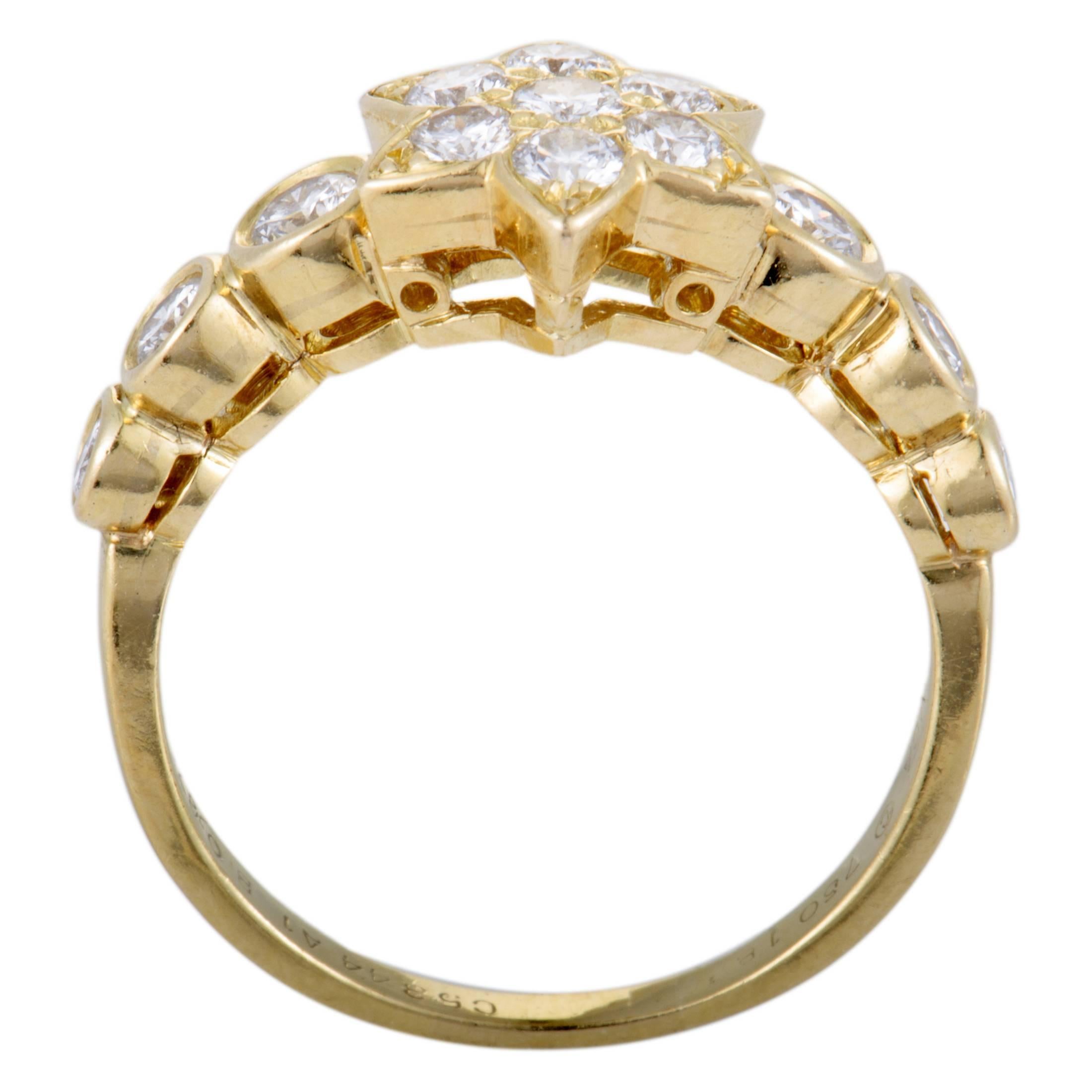 This fascinating vintage floral ring by Van Cleef & Arpels is an item of prestigious quality and refined aesthetic style. The fabulous shimmer of 18K yellow gold in its design is perfectly complemented with the timeless resplendence of F-color,