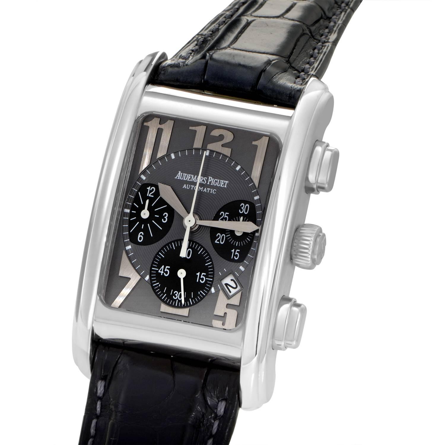 Audemars Piguet automatic stainless steel wristwatch on a black crocodile leather strap. Watch displays hours, minutes, small seconds, date, and a chronograph feature on a slate gray dial.