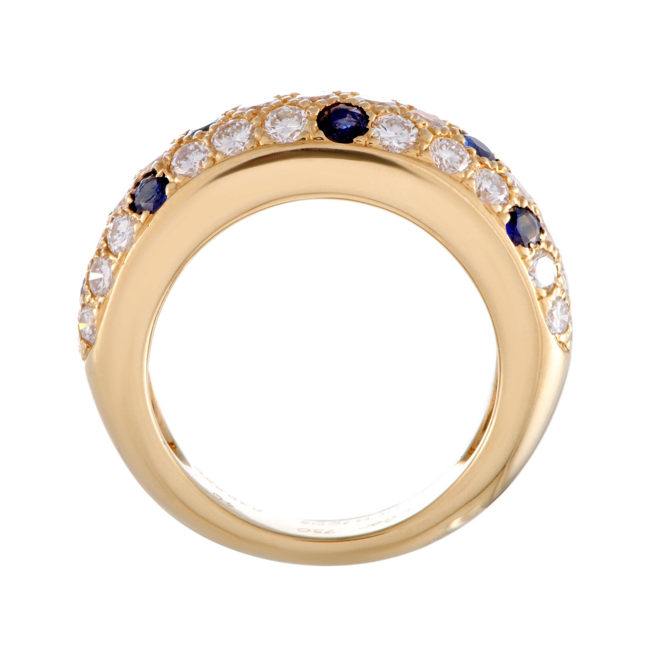 The enchanting radiance of 18K yellow gold brings out in a most luxurious fashion the sublime resplendence of diamonds and the regal allure of sapphires in this exceptional ring that is designed by Cartier. The diamonds boast grade E color and VS