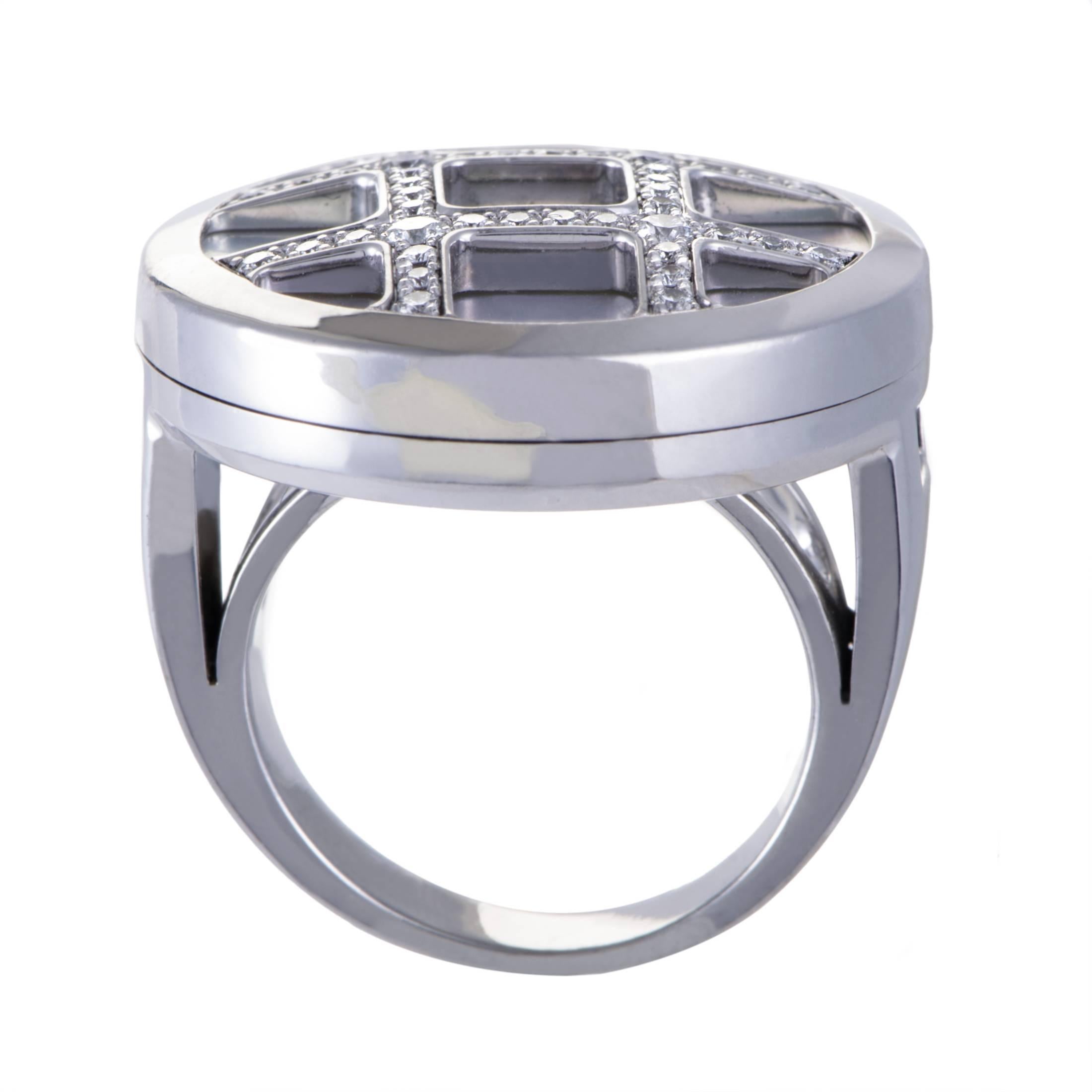 Wonderful diamonds shine in neat pattern against the delightful mother of pearl in this astonishing ring from Cartier which is made of prestigious 18K white gold and boasts a shape that compels with its offbeat idea and impeccable crafting.Ring Top