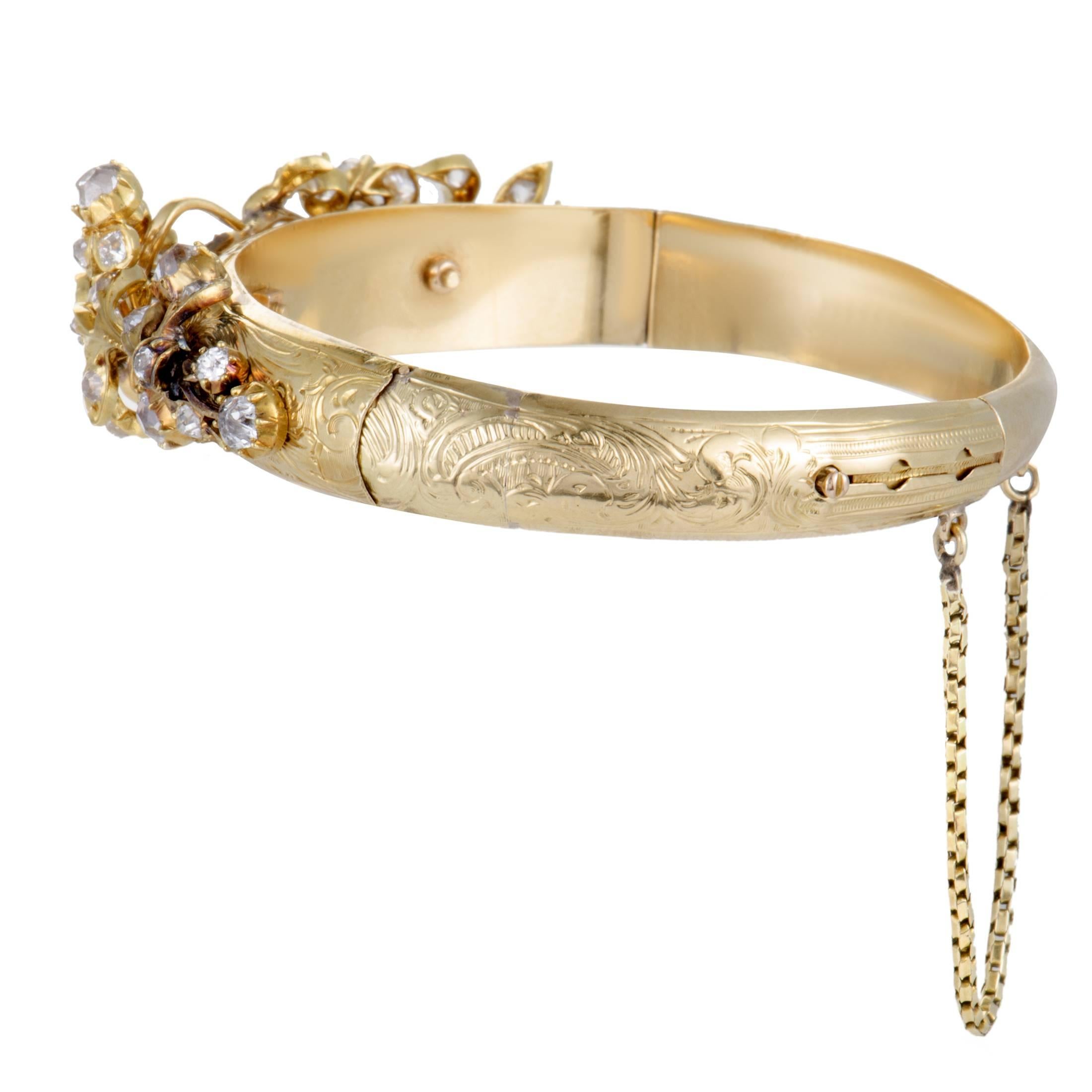 Splendidly designed and opulently embellished, this antique bracelet compels with its timeless appeal and intricate décor. The bracelet is made of classic 18K yellow gold and set with approximately 4.25 carats of diamonds.
Diameter 2.12