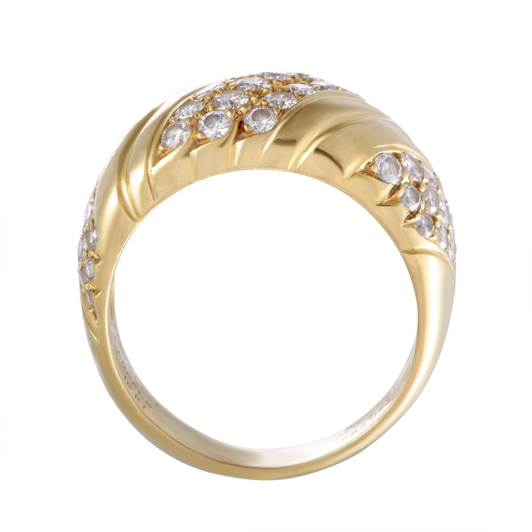 Exquisitely crafted from luxurious 18K yellow gold and beautifully decorated with scintillating diamonds, this gorgeous ring offers an incredibly sophisticated appearance. The ring is a Van Cleef & Arpels design and boasts a total of 1.25 carats of