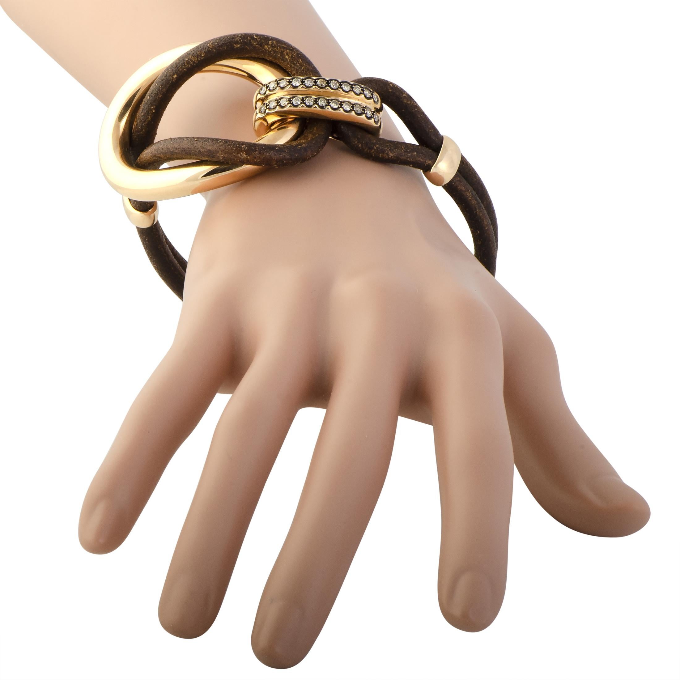 A compellingly fashionable look is achieved in this superb jewelry piece by combining the ever-luxurious gold with stylish leather and topping it all off with sophisticated brown diamonds. The bracelet is exquisitely designed by Bucherer and it is